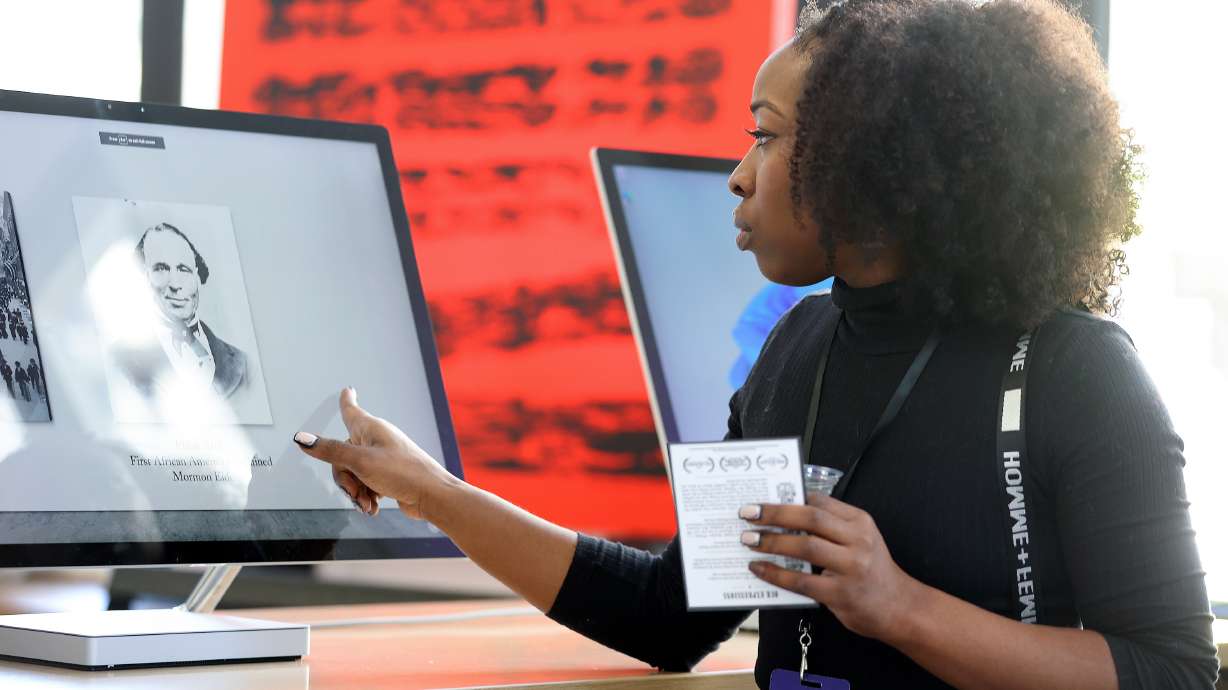 Shawn Morris looks through Black Museum, Utah’s digital interactive exhibit in Salt Lake City on Thursday. The digital interactive exhibit is a preview of one the Utah Black Chamber hopes to make permanent in the near future.