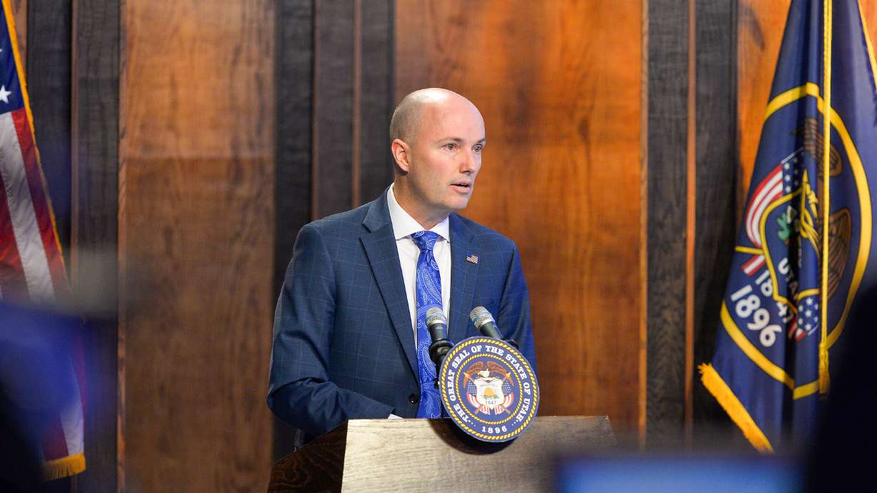 Gov. Spencer Cox holds his monthly news conference in Salt Lake City on Thursday. He applauded portions of a federal program that allow some Latin American migrants into the country on humanitarian grounds, but said little about Utah's lawsuit to halt the program.