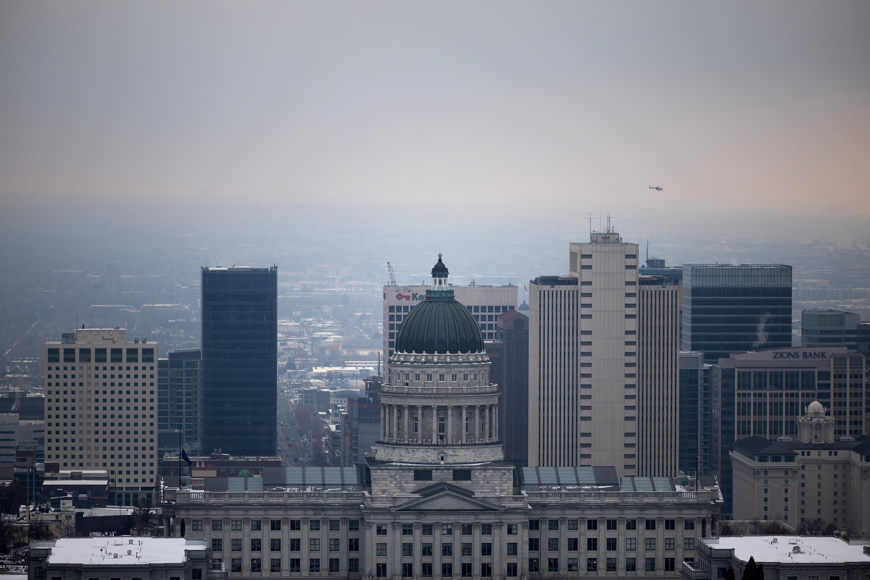 A layer of inversion keeps the skies grey over Salt Lake City on Thursday, Jan. 26. A small system could produce a brushing of snow in the area Saturday night into Sunday.