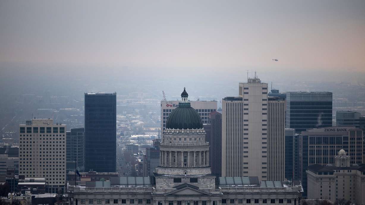 A layer of inversion keeps the skies grey over Salt Lake City on Thursday, Jan. 26. A small system could produce a brushing of snow in the area Saturday night into Sunday.