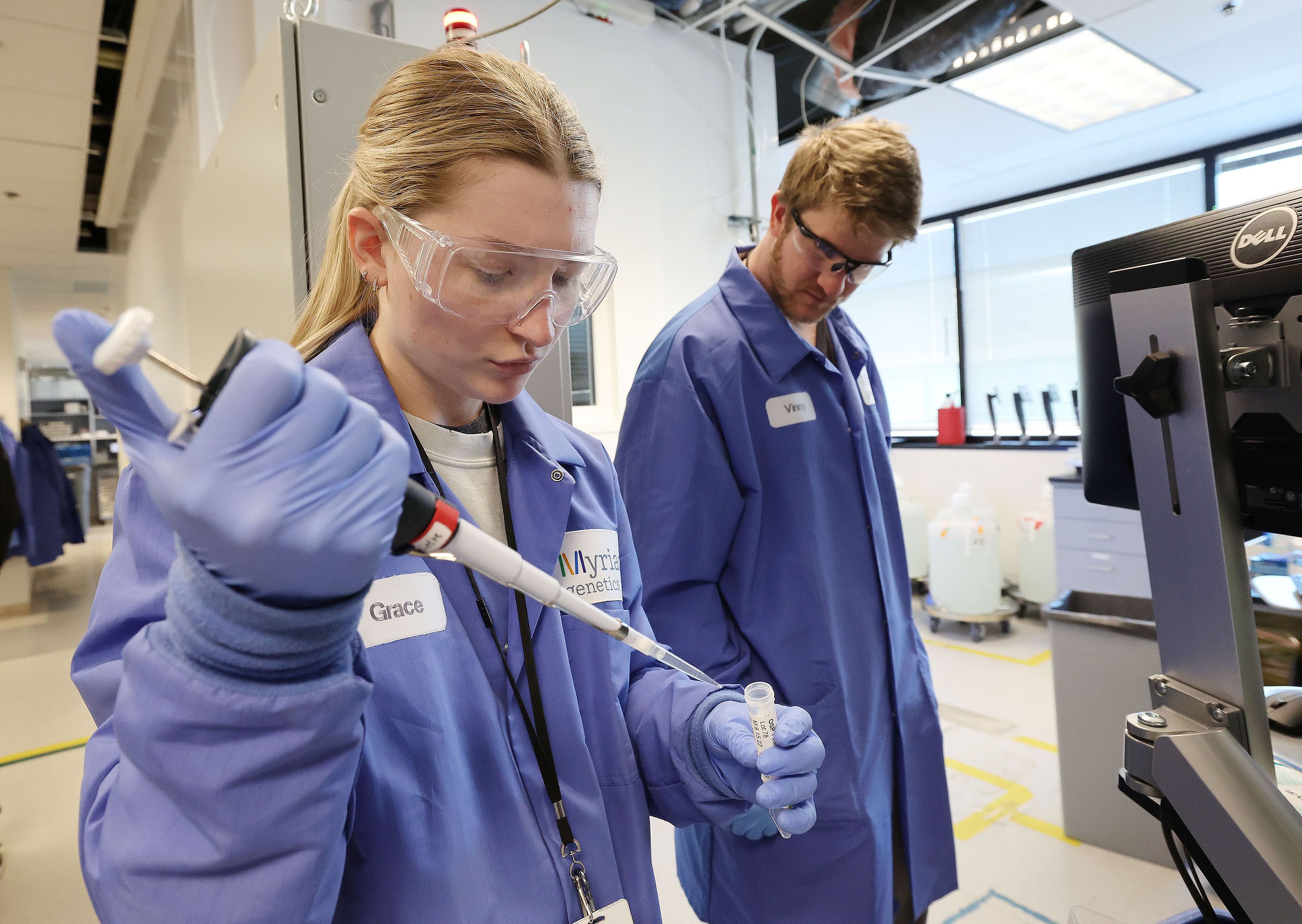 Lab technicians Grace Winternheimer and Vinny Zaluski work with patient DNA samples in the lab at Myriad Genetics in Salt Lake City on Feb. 7. Myriad Genetics is a client of Utah-based MasterControl, which has become a global life sciences software leader.