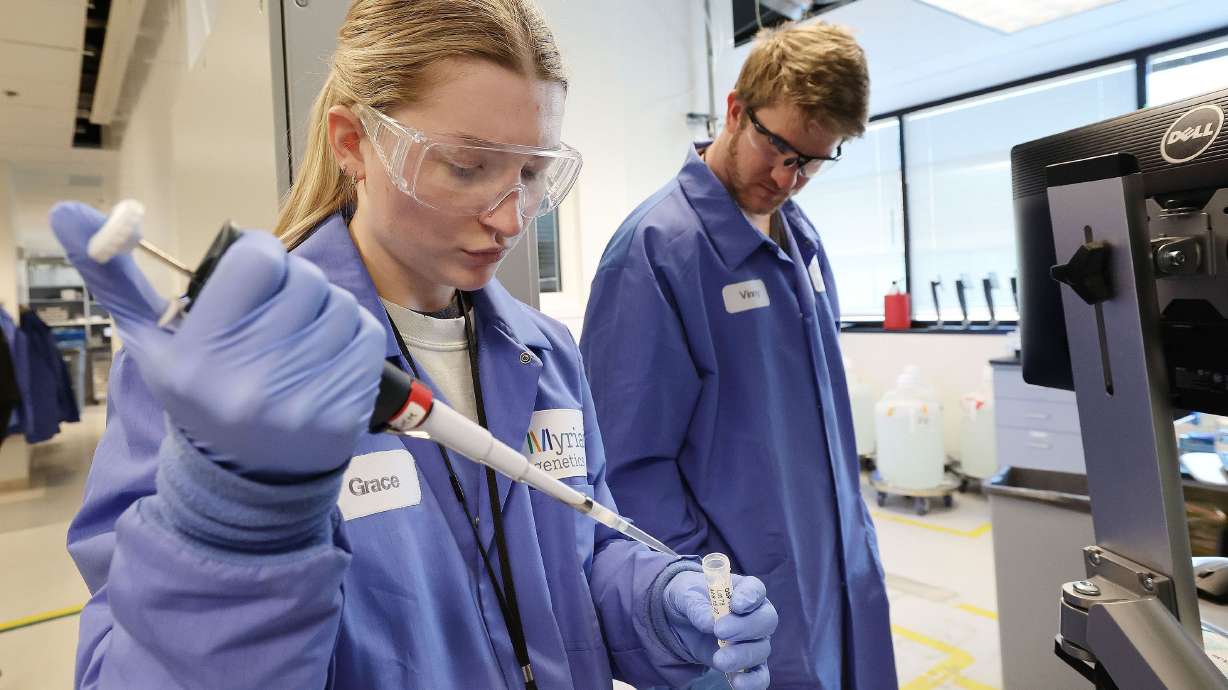 Lab technicians Grace Winternheimer and Vinny Zaluski work with patient DNA samples in the lab at Myriad Genetics in Salt Lake City on Feb. 7. Myriad Genetics is a client of Utah-based MasterControl, which has become a global life sciences software leader.