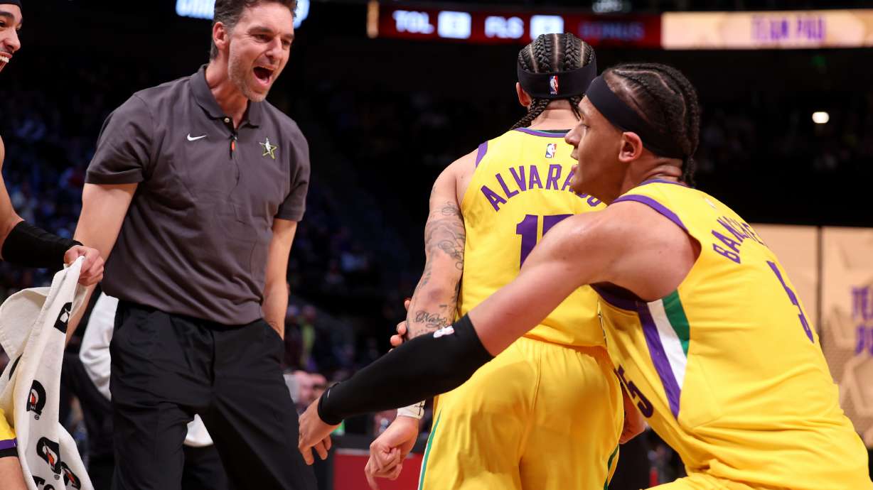 Pau Gasol celebrates with Team Pau's Jose Alvarado (15) and the other team members after Alvarado sank the game-winning shot in the championship of the Rising Stars games during All-Star Weekend in Salt Lake City at Vivint Arena on Friday, Feb. 17, 2023.