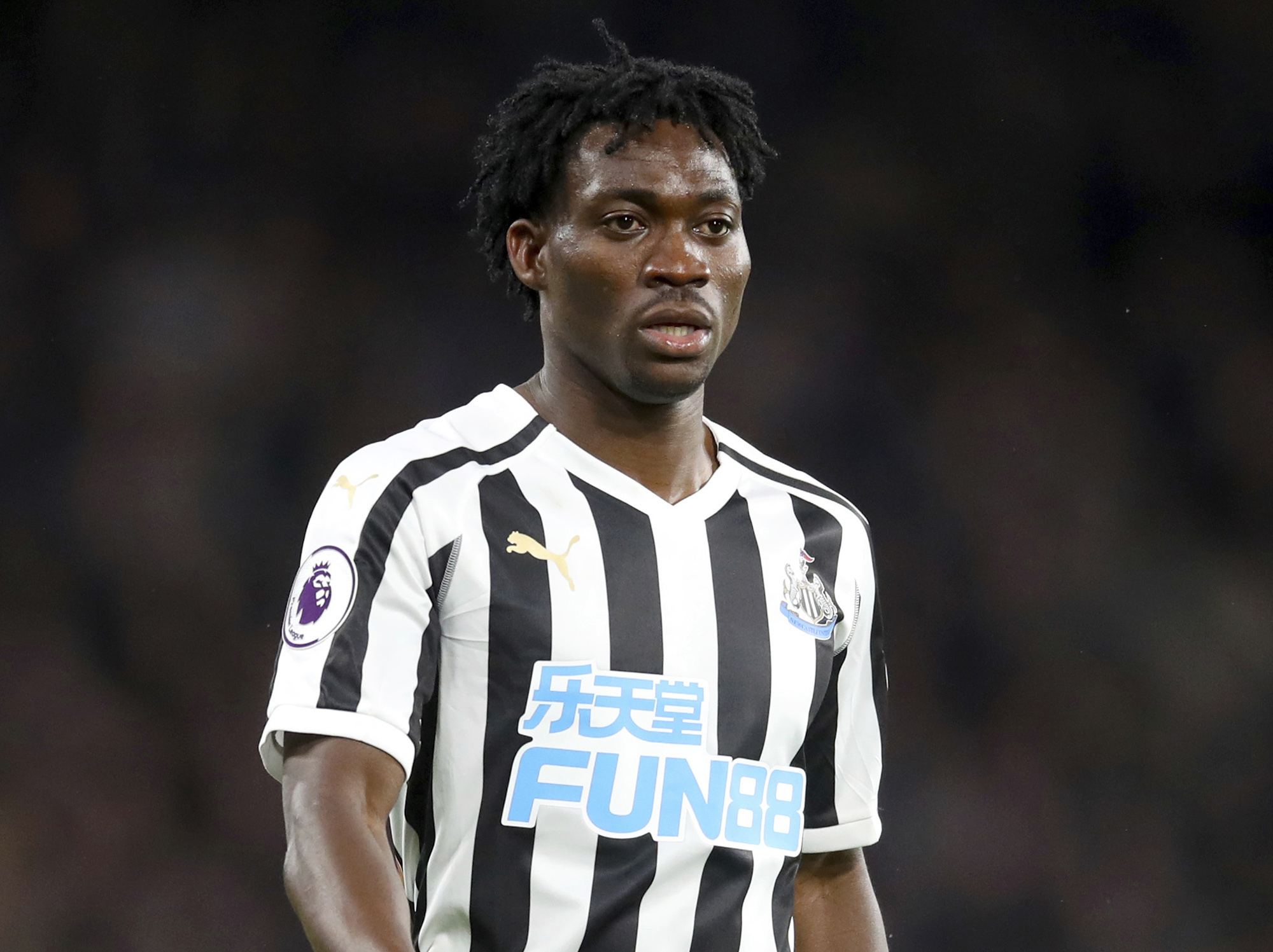 FILE - Christian Atsu plays for Newcastle United, Jan. 12, 2019. Search teams have recovered the body of Ghanaian international soccer player Christian Atsu in the ruins of a building that collapsed during the devastating earthquake that struck Turkey and Syria, his manager said Saturday Feb. 18, 2023. 