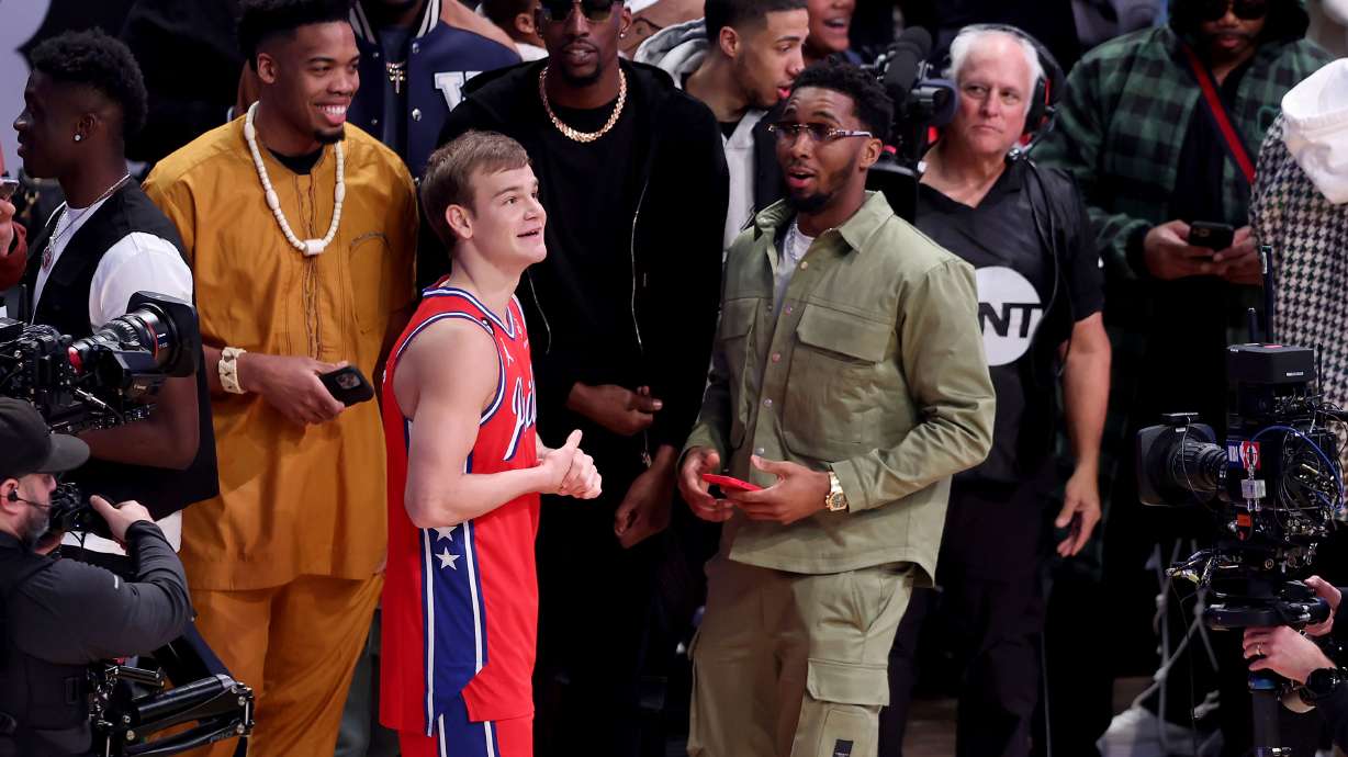 Philadelphia 76ers’ Mac McClung looks up at the video monitor after his slam dunk during the NBA All-Star Slam Dunk Contest at Vivint Arena Saturday Feb. 18, 2023. McClung took first place in the contest.