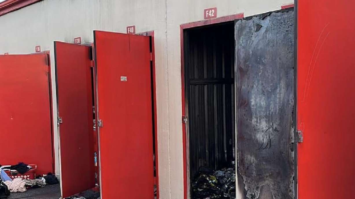 The scene of a storage unit fire at 4608 S. 900 East in Murray on Saturday. One person and one dog were found dead after a storage unit caught fire, according to the Murray fire department.