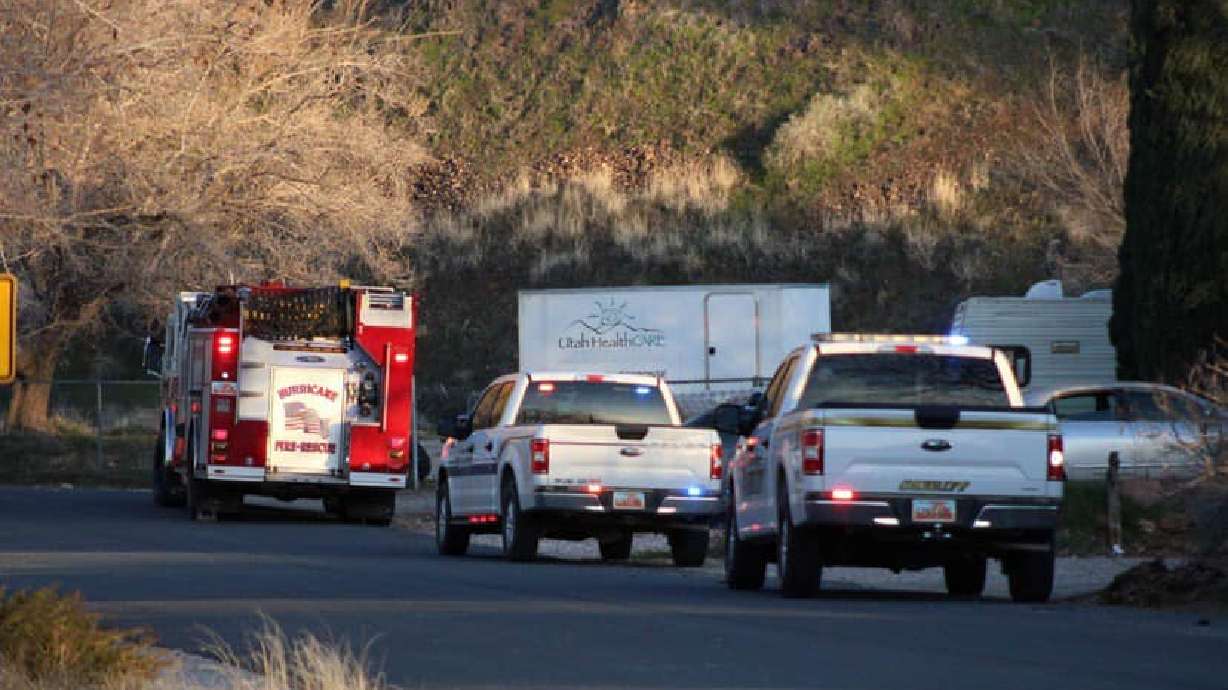 Emergency personnel arriving at the scene where a 17-year-old boy was found dead after a 150-foot fall off a cliff in Washington County on Saturday.