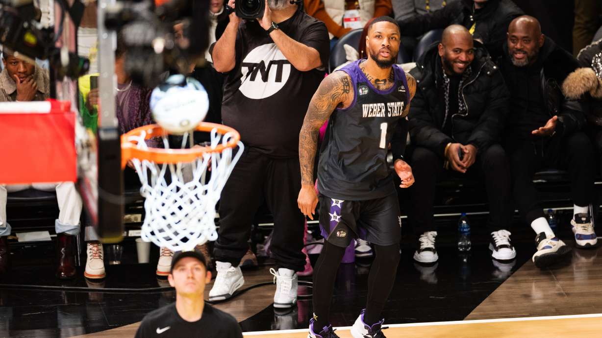 Portland Trailblazers guard Damian Lillard watches as his shot goes in during the NBA 3-Point Contest during the NBA All-Star 2023 Saturday Night at Vivint Arena in Salt Lake City on Feb. 18, 2023.