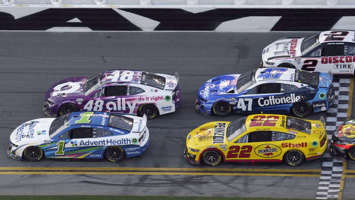 Ross Chastain (1) edges Alex Bowman (48), Joey Logano (22), Ricky Stenhouse Jr. (47) and Austin Cindric (2) to win the second stage during the NASCAR Daytona 500 auto race Sunday, Feb. 19, 2023, at Daytona International Speedway in Daytona Beach, Fla.