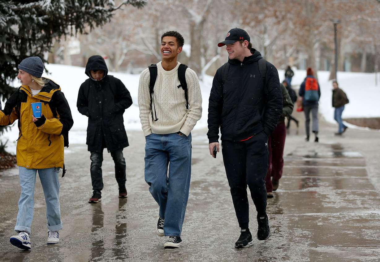Edsel Christensen and Cael Wightman walk through the University of Utah campus in Salt Lake City, on Feb. 6.