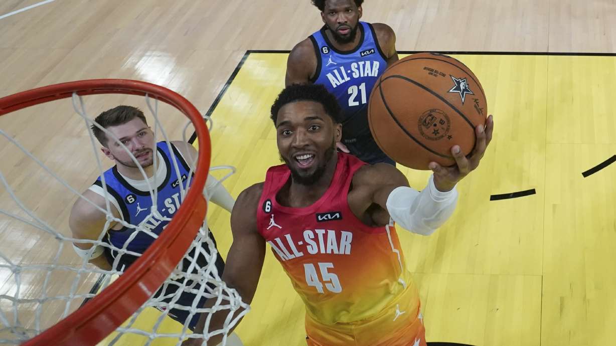 Team Giannis guard Donovan Mitchell (45) shoots during the second half of the NBA basketball All-Star game Sunday, Feb. 19, 2023, in Salt Lake City.