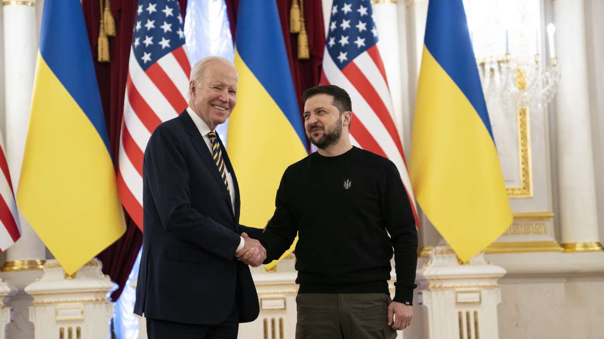 U.S. President Joe Biden, left, shakes hands with Ukrainian President Volodymyr Zelenskyy at Mariinsky Palace during an unannounced visit in Kyiv, Ukraine, Monday.
