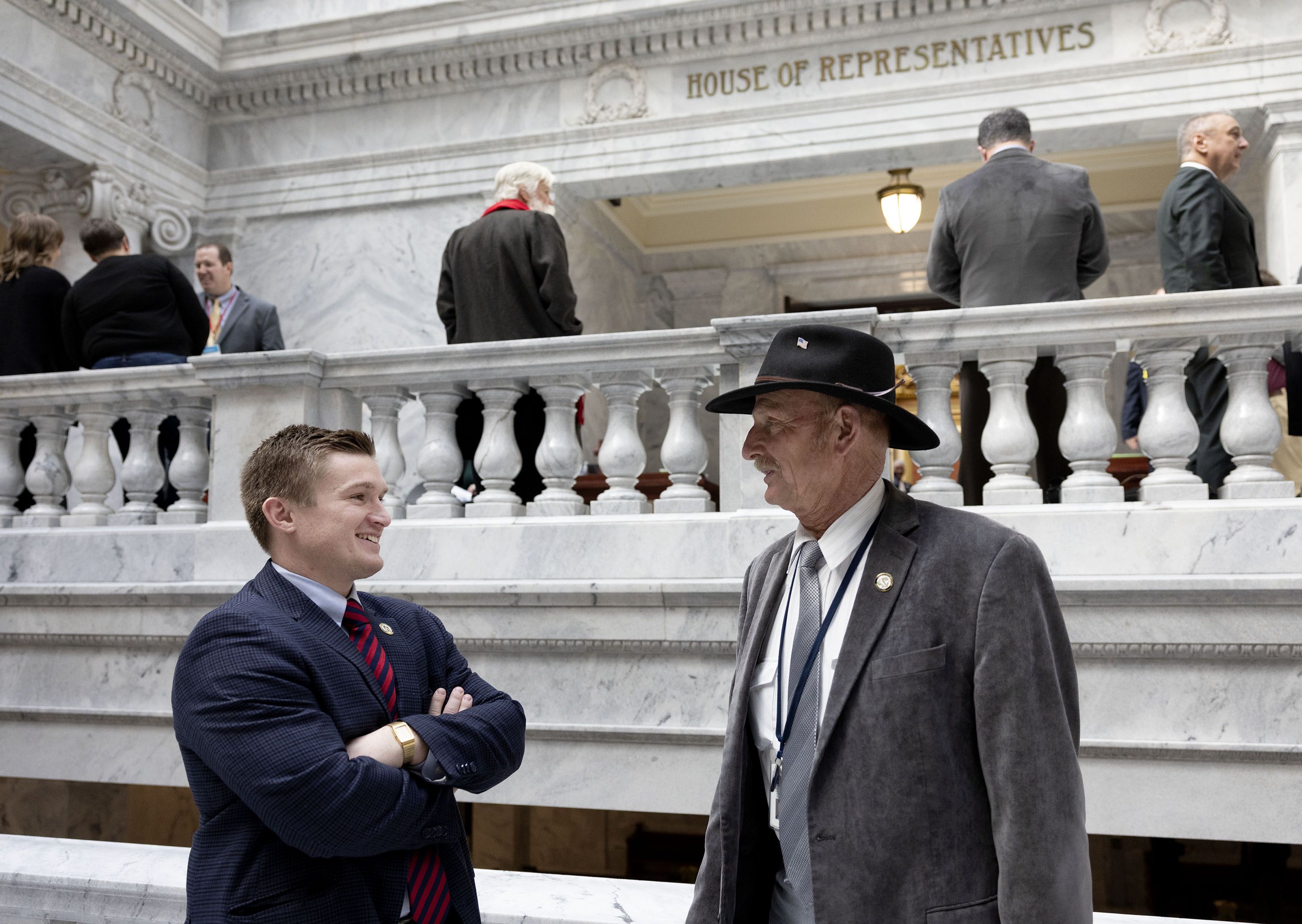 Rep. Tyler Clancy, R-Provo, speaks with Rep. Scott Chew, R-Jensen, at the Capitol in Salt Lake City on Feb. 1.