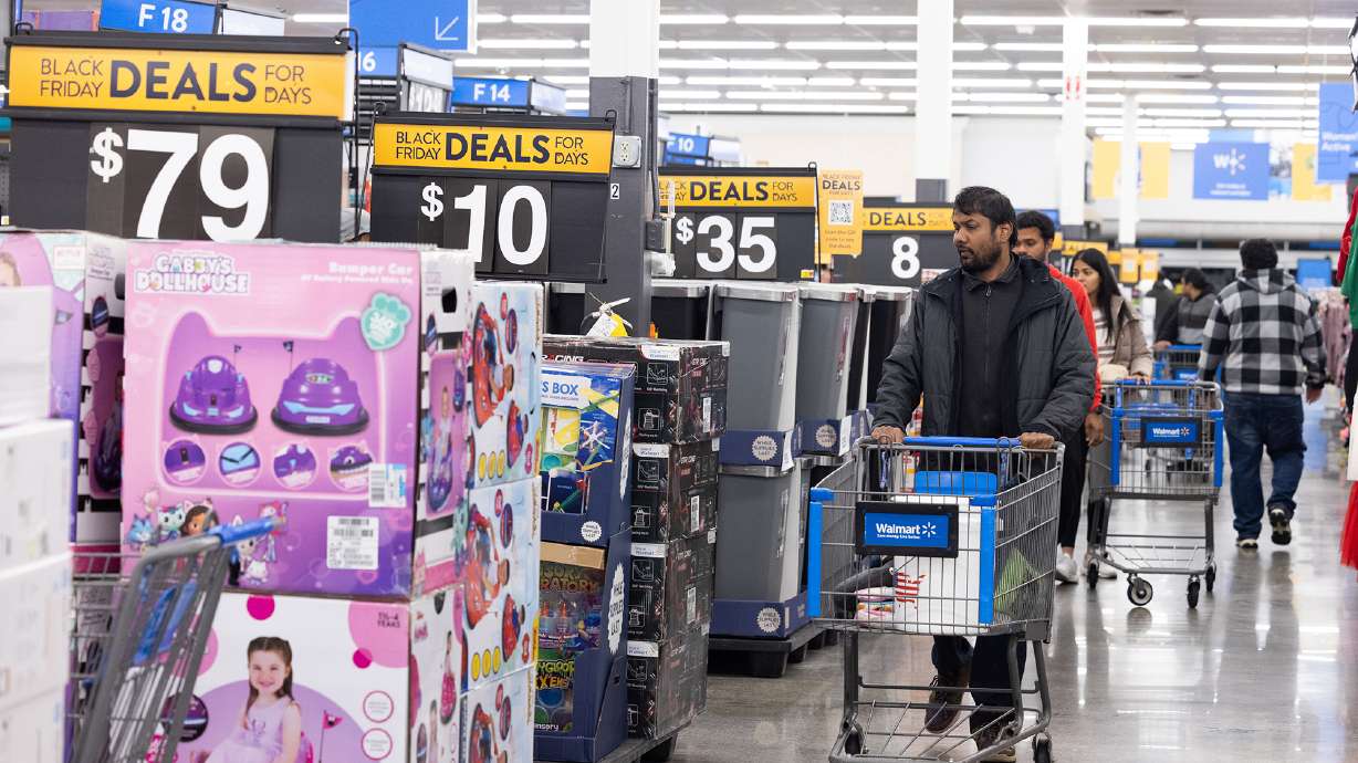 Walmart on Tuesday forecast slower sales and profit growth as inflation takes its toll. Pictured is a Walmart store in Dunwoody, Georgia, in 2022.