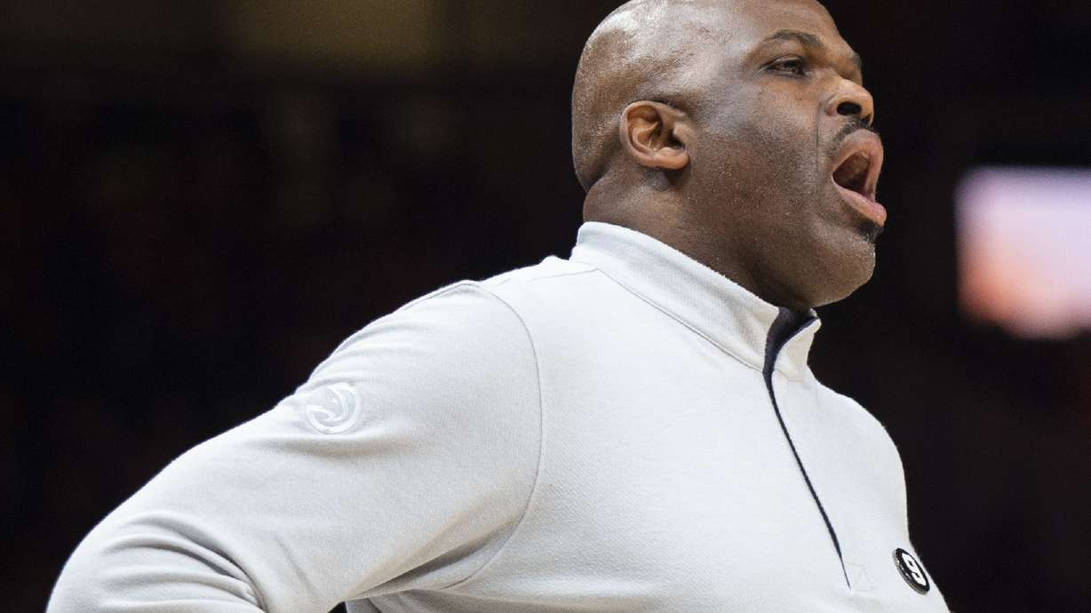 Atlanta Hawks head coach Nate McMillan directs his team during the first half of an NBA basketball game against the New York Knicks, Wednesday, Feb. 15, 2023, in Atlanta.