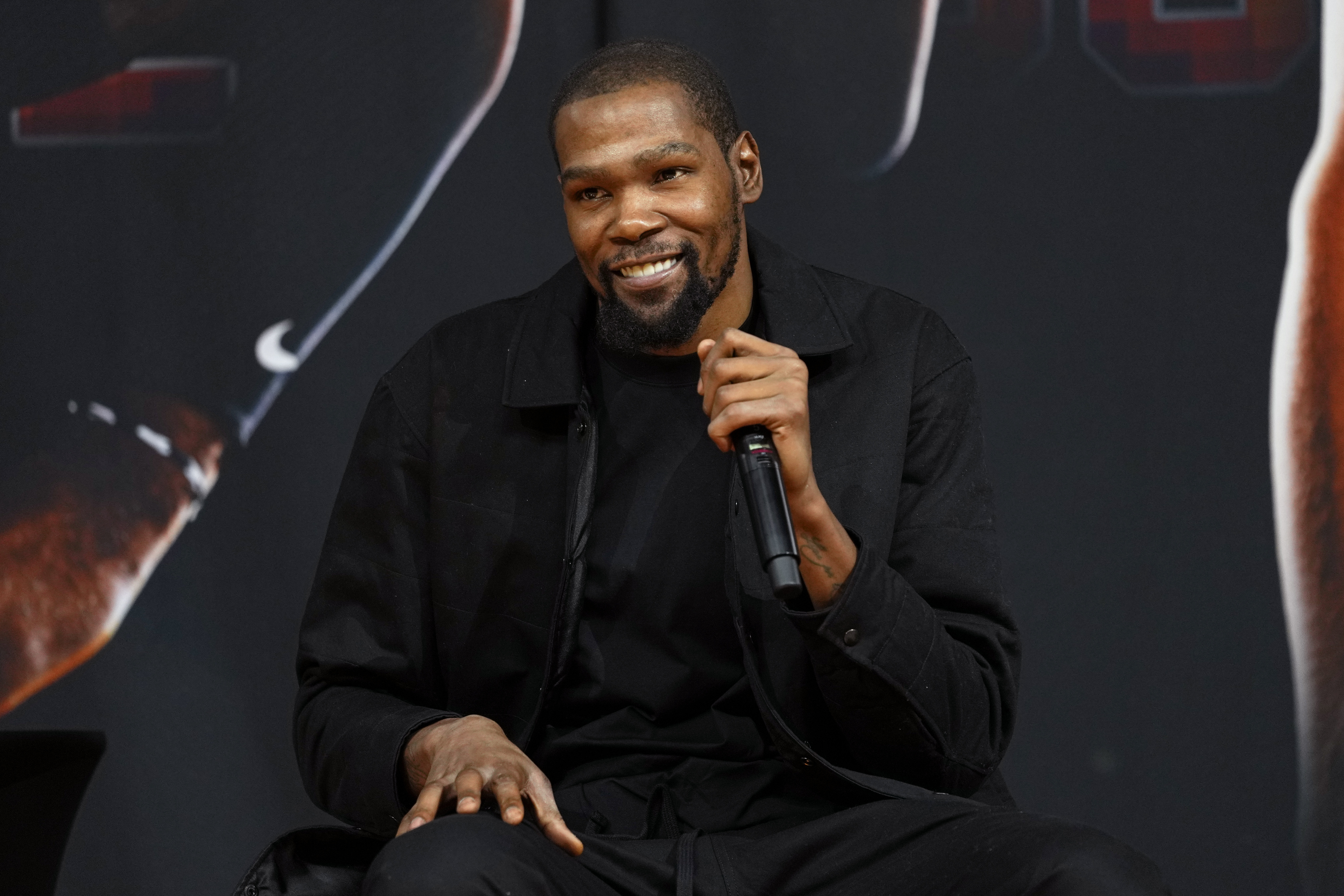 Phoenix Suns forward Kevin Durant, speaks to the media after being introduced during an NBA basketball team availability, Thursday, Feb. 16, 2023, in Phoenix. 