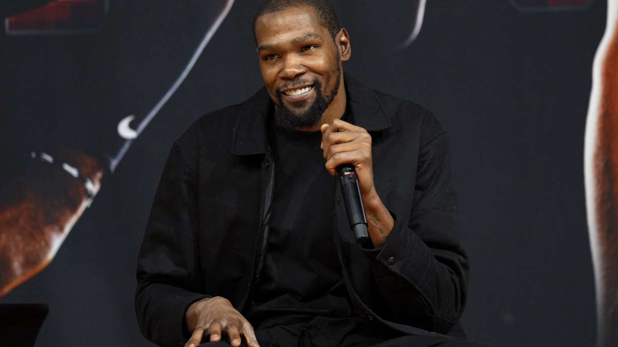 Phoenix Suns forward Kevin Durant, speaks to the media after being introduced during an NBA basketball team availability, Thursday, Feb. 16, 2023, in Phoenix.