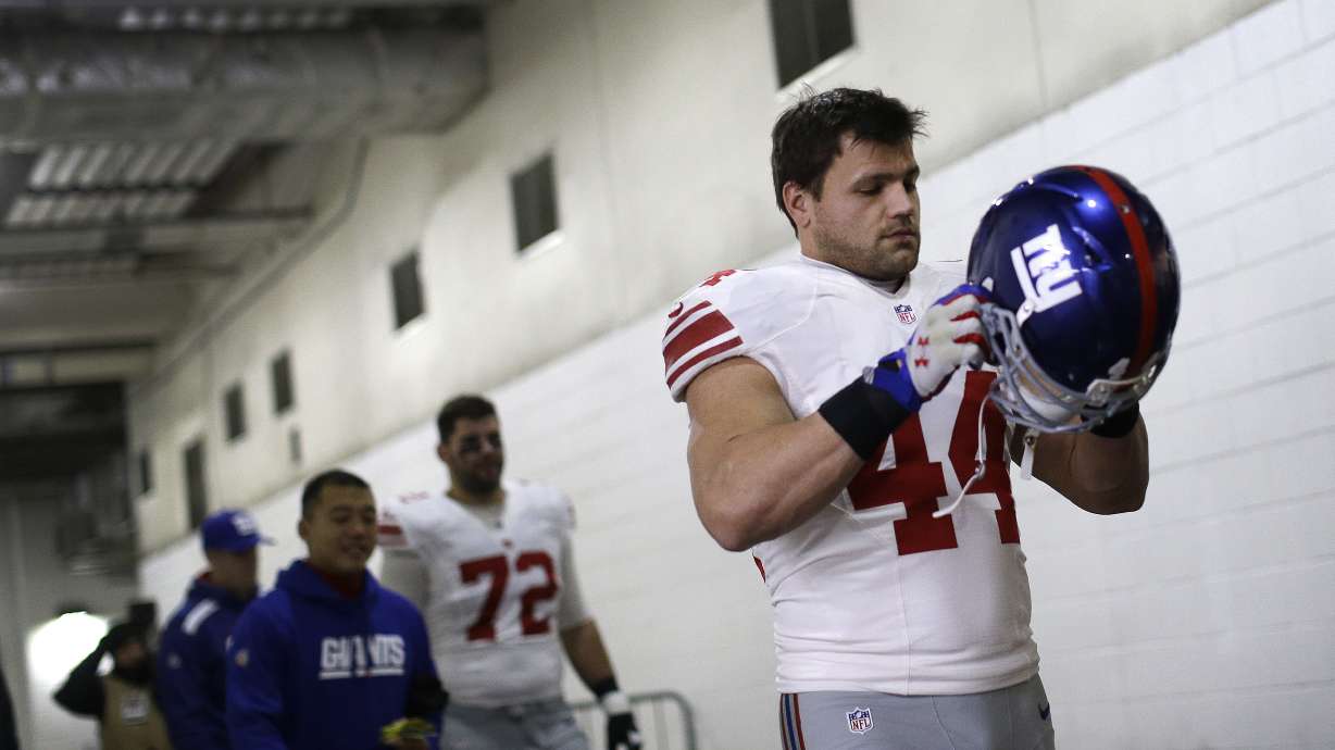 New York Giants running back Peyton Hillis seen on Dec. 1, 2013, in Landover, Md., said he is on the road to recovery after he nearly died while saving his two children from drowning in Florida.