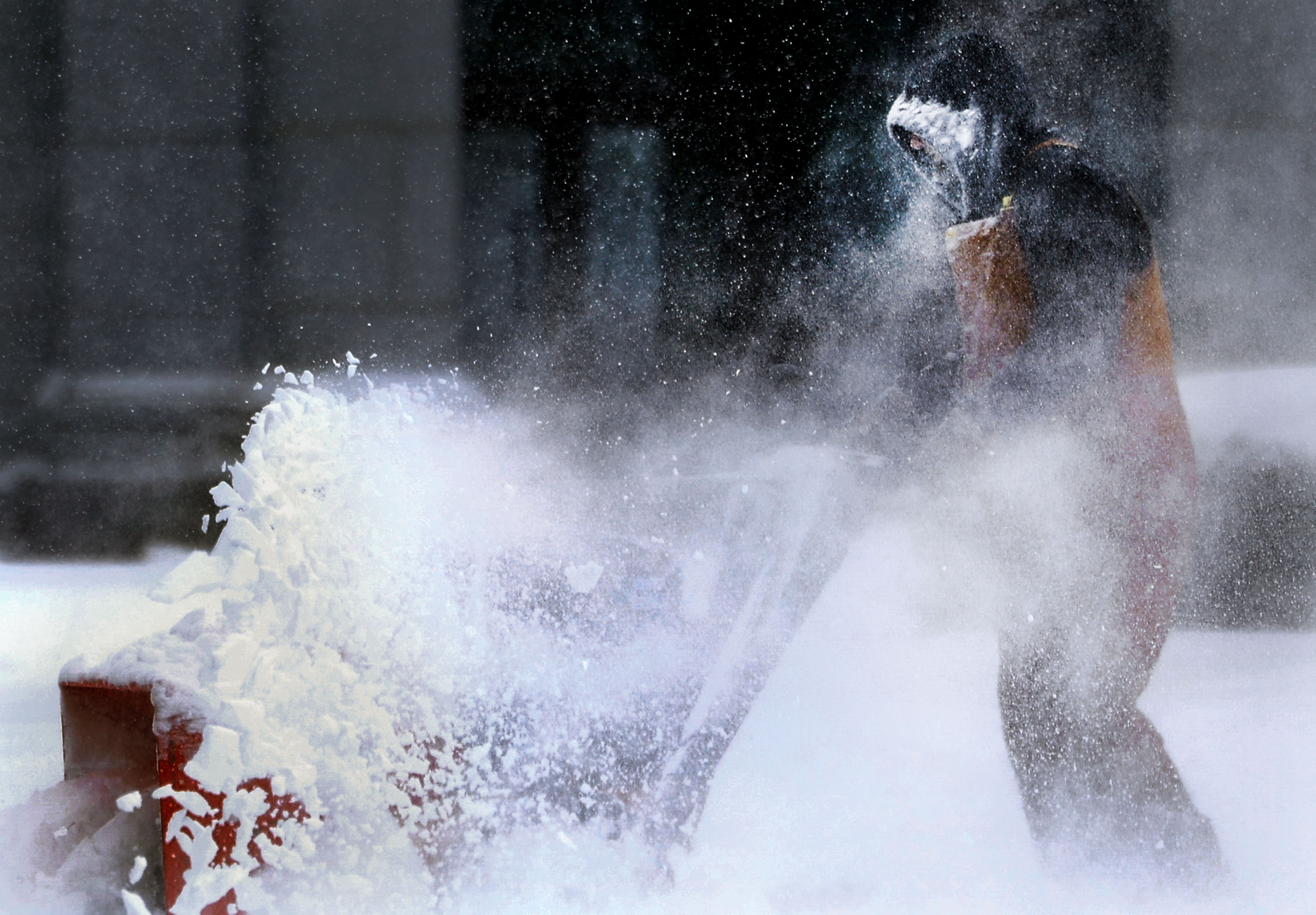 Capitol groundskeeper Mike Nielson clears the walkways at the Capitol in Salt Lake City on Wednesday. There are still some lingering weather impacts in Utah expected Thursday and Friday.