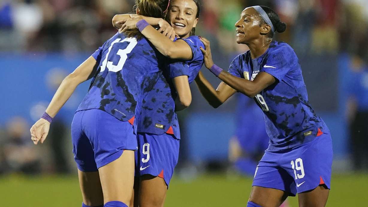 United States forward Alex Morgan (13) celebrates her goal with teammates Mallory Swanson (9) and Crystal Dunn (19) during the first half of a SheBelieves Cup soccer match against Brazil, Wednesday, Feb. 22, 2023, in Frisco, Texas.