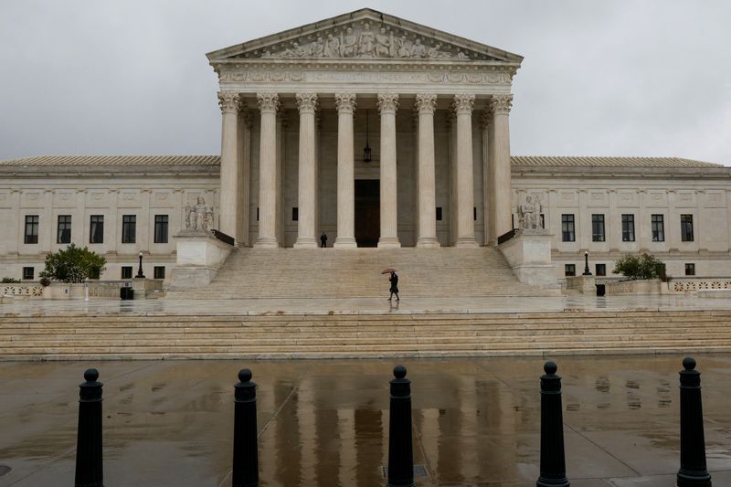 A general view of the U.S. Supreme Court building in the rain the day before the start of the court's new term in Washington, October 2, 2022.