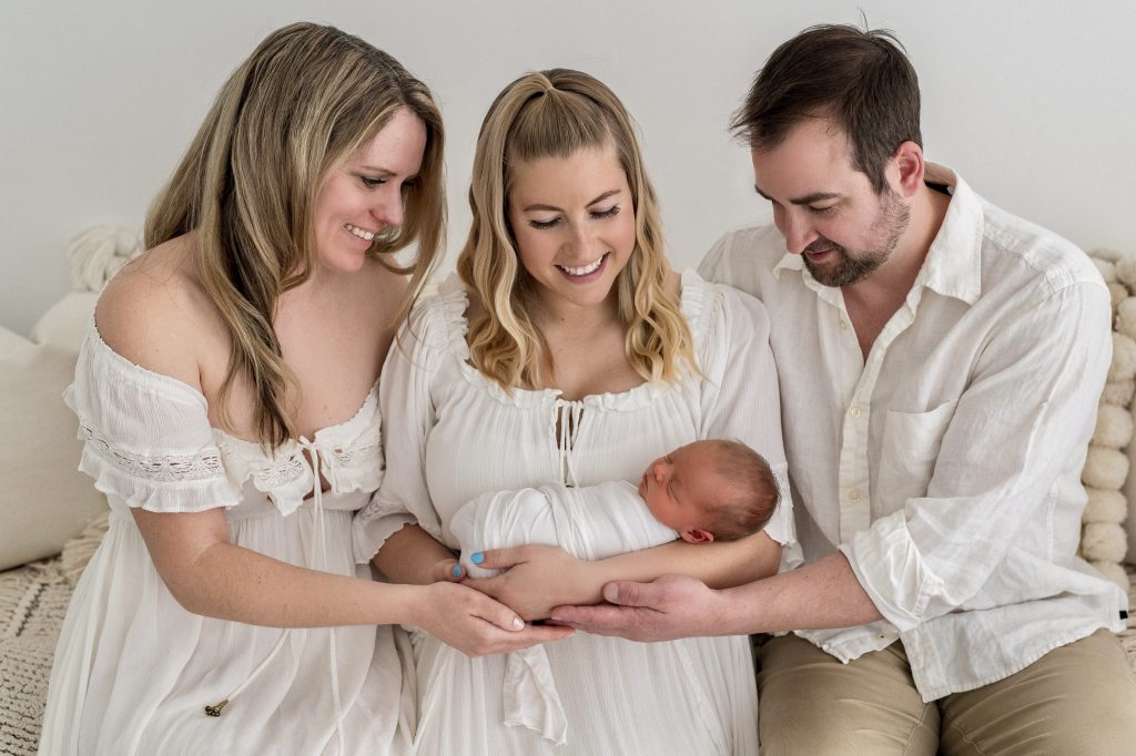 New parents Virginia and Jared show their appreciation for surrogate Tassia Burgess and the birth of their baby boy, location and date unspecified.