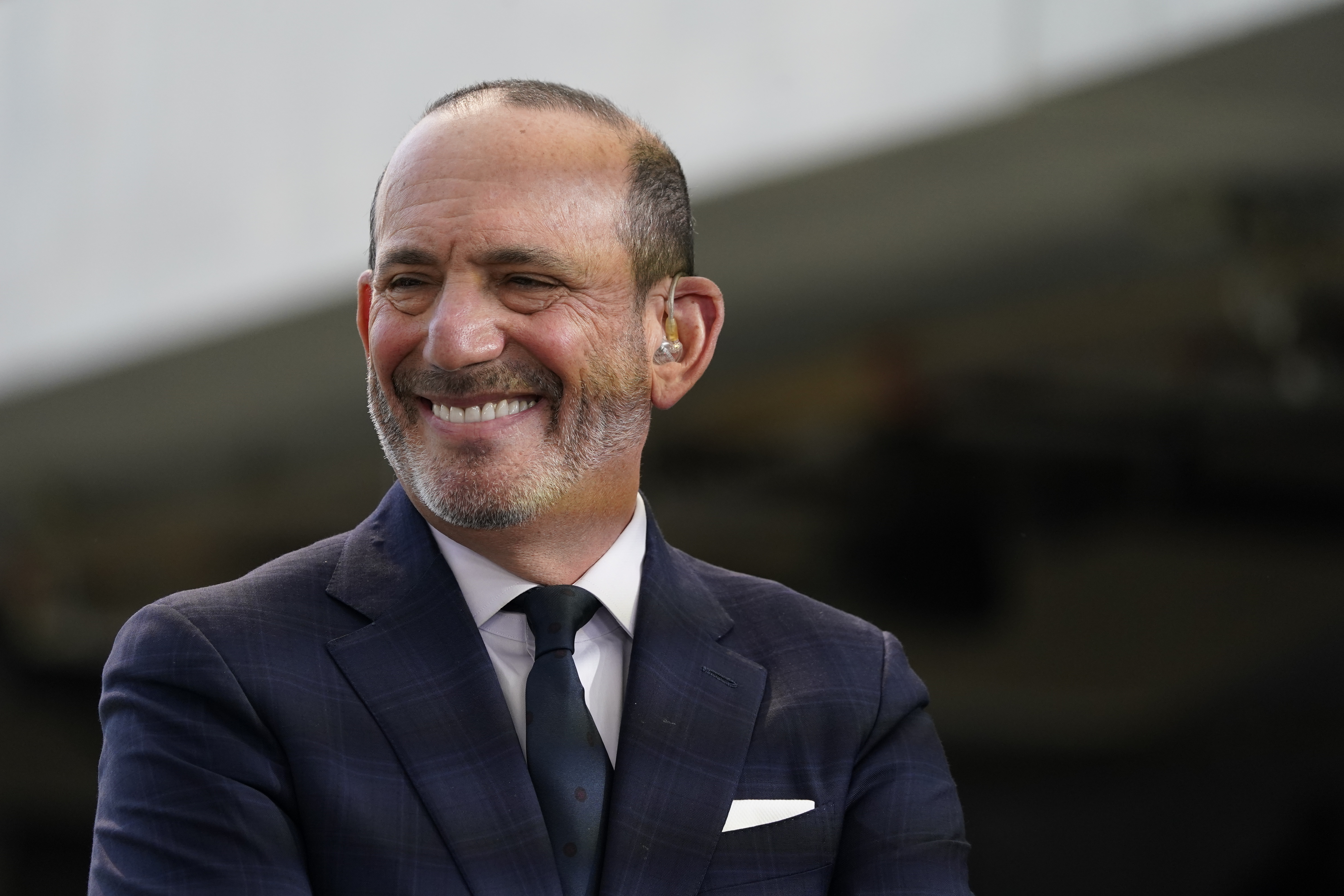 FILE - MLS Commissioner Don Garber conducts an interview before the MLS Cup soccer match between LAFC and the Philadelphia Union, Saturday, Nov. 6, 2022, in Los Angeles. With opening approaching Saturday, Feb. 25, 2023, Major League Soccer Commissioner Don Garber said he hopes to pick a 30th team by the end of the year and defended an expanded playoff format in which 18 of 29 clubs each the playoffs. 