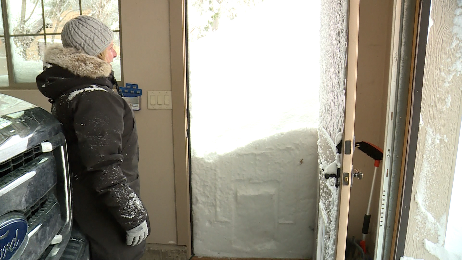 Shannon Pratt opens her garage door to find a wall of snow at her Draper home Thursday. Residents in the SunCrest neighborhood were still digging out from the latest storm.