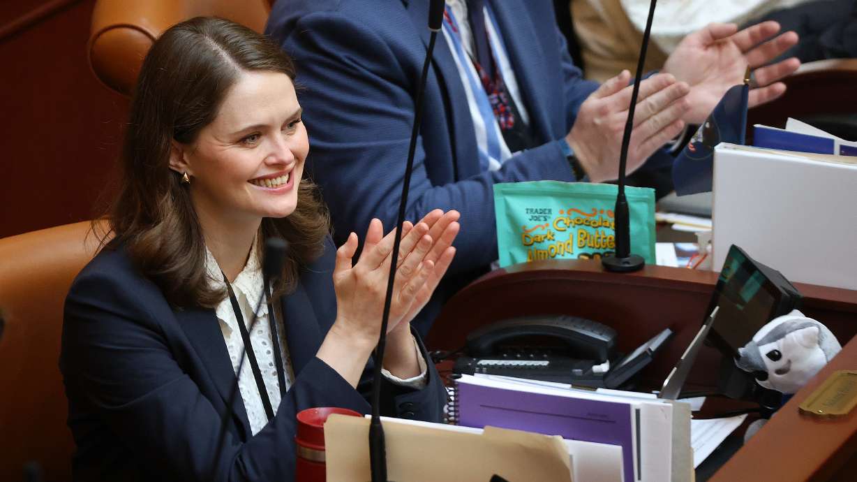 Rep. Sahara Hayes applauds as U.S. Olympic and Paralympic Committee leaders are welcomed in the House chamber at the Capitol in Salt Lake City, on Feb. 16.
