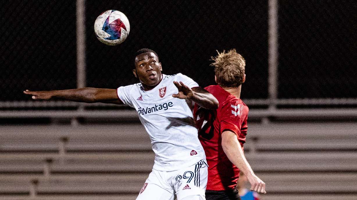 Anderson Julio jumps to head the ball during the preseason.