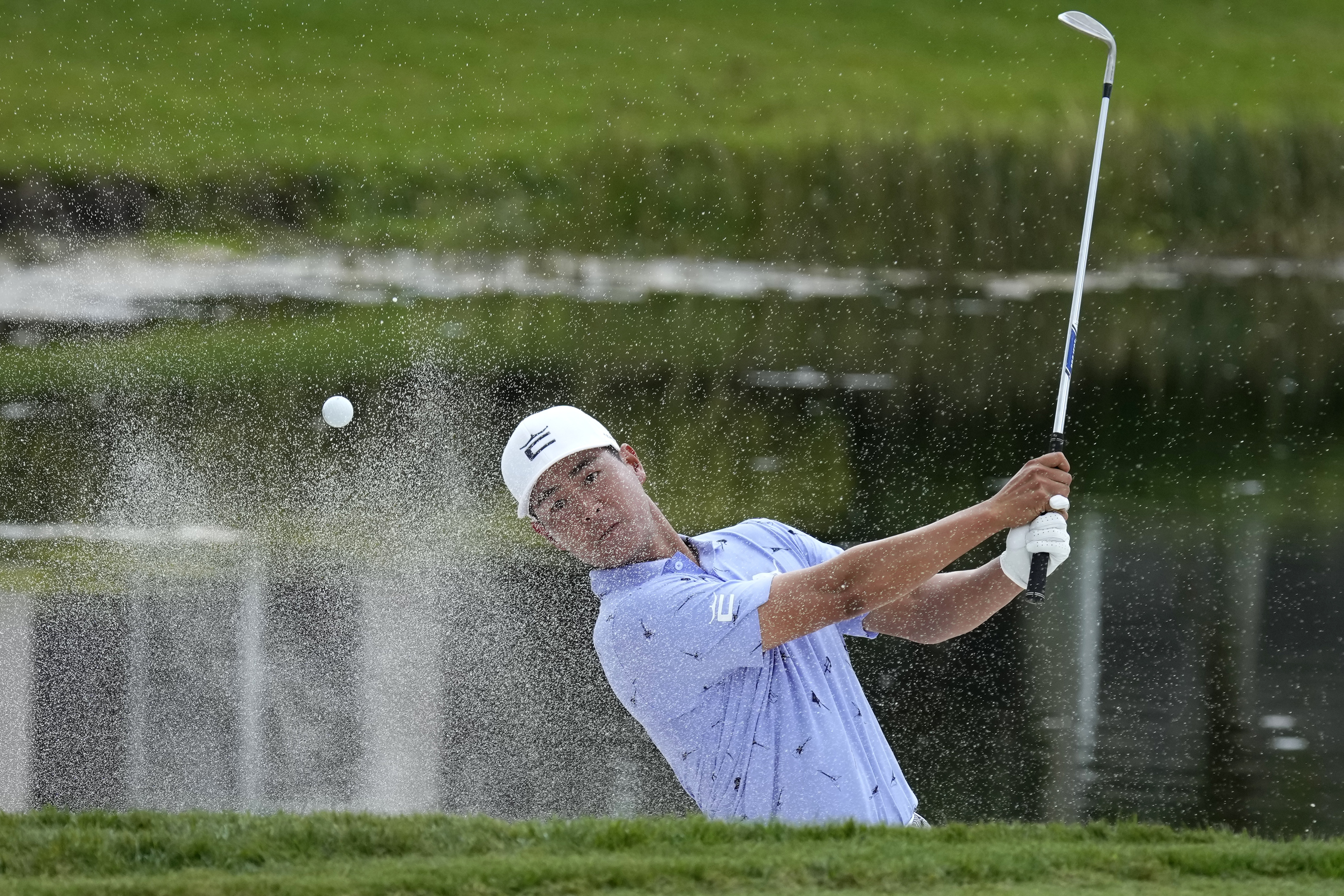 Justin Suh hits onto the 16th green during the second round of the Honda Classic golf tournament, Friday, Feb. 24, 2023, in Palm Beach Gardens, Fla. 
