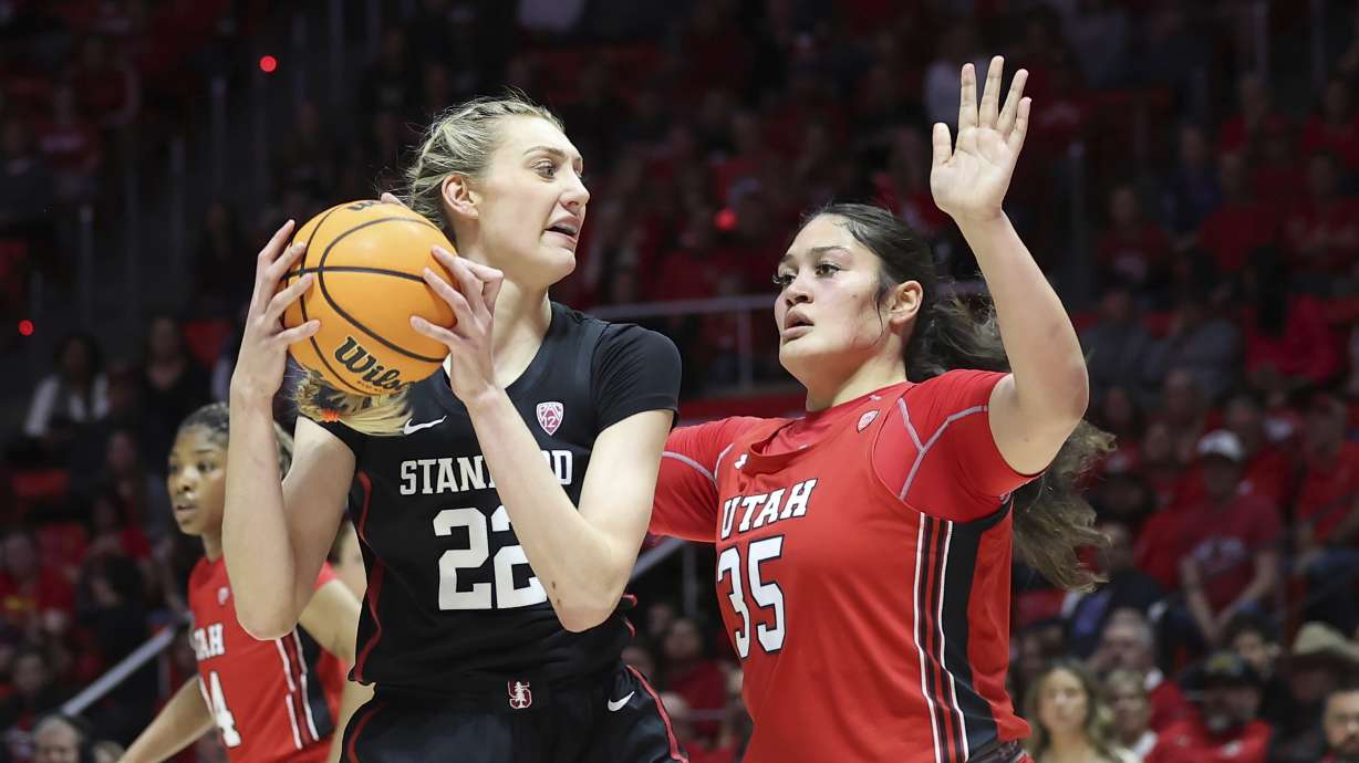 Stanford forward Cameron Brink (22) posts up against Utah forward Alissa Pili (35) in the first half of an NCAA College Basketball Game Saturday, Feb. 25, 2023, in Salt Lake City.