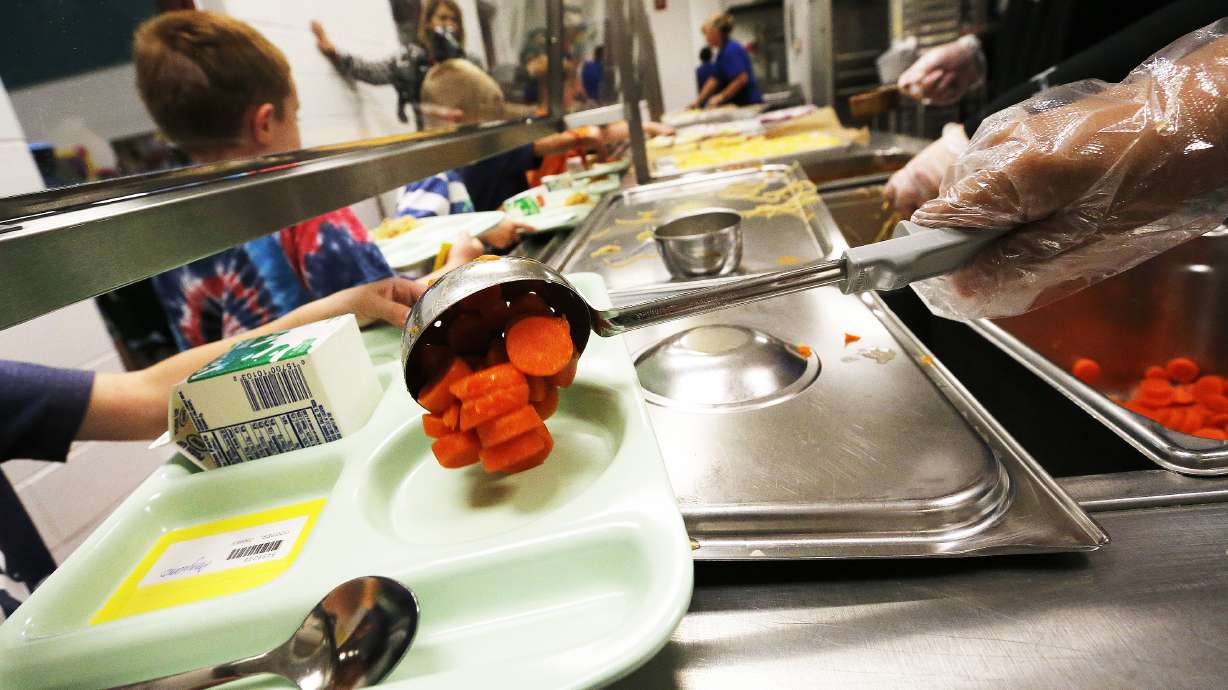 Hayden Peak Elementary School students are served lunch in West Jordan on Aug. 12, 2014. A new CDC study says about half of Utah children age 5 and under are not eating enough fruits and vegetables.