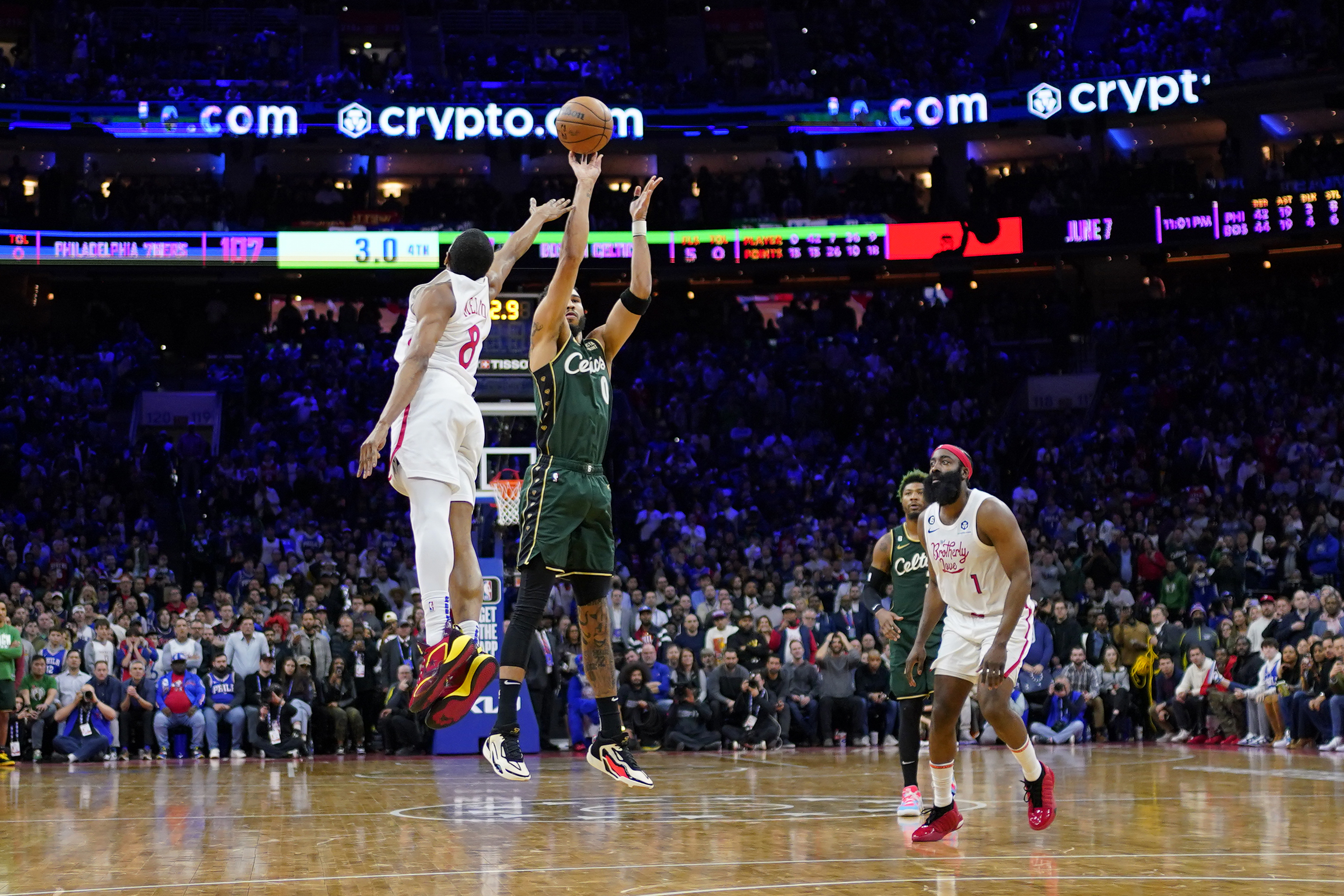 Boston Celtics' Jayson Tatum (0) goes up for the go-ahead shot against Philadelphia 76ers' De'Anthony Melton (8) during the final seconds of an NBA basketball game, Saturday, Feb. 25, 2023, in Philadelphia. 