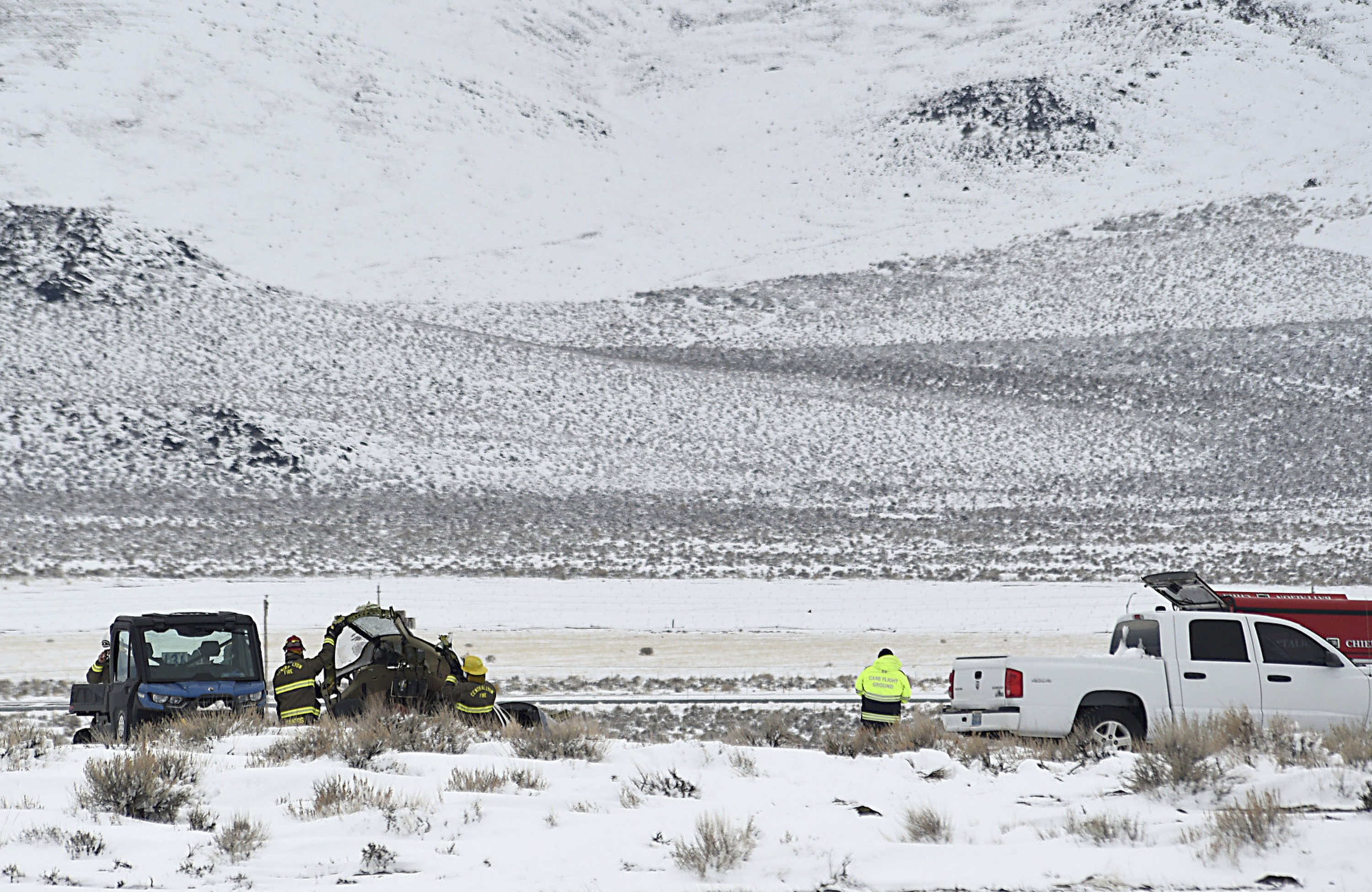 A Care Flight medical transport plane carrying a patient and four others that crashed the day before is seen Saturday, in Lyon County, Nev. All five people on board were killed.
