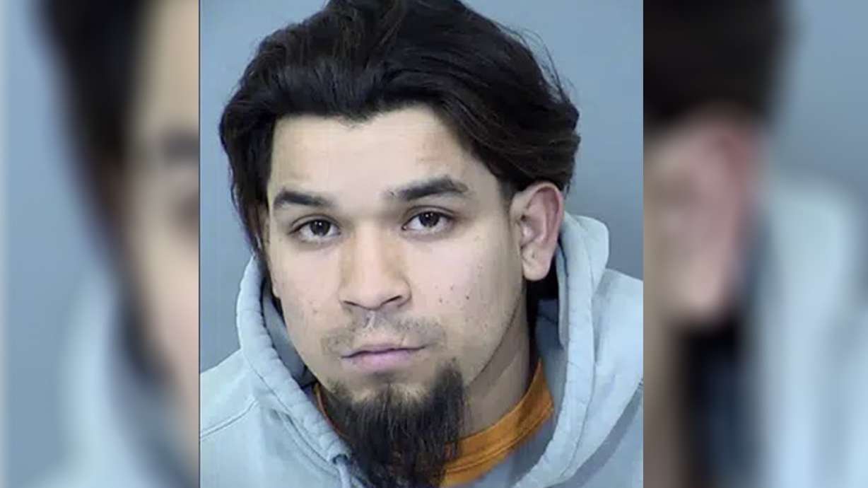 This Sunday booking photo shows suspect Pedro Quintana-Lujan, 26. He was arrested in connection with a crash that killed two bicyclists and injured 11 others in Goodyear, a Phoenix suburb, authorities said Sunday.