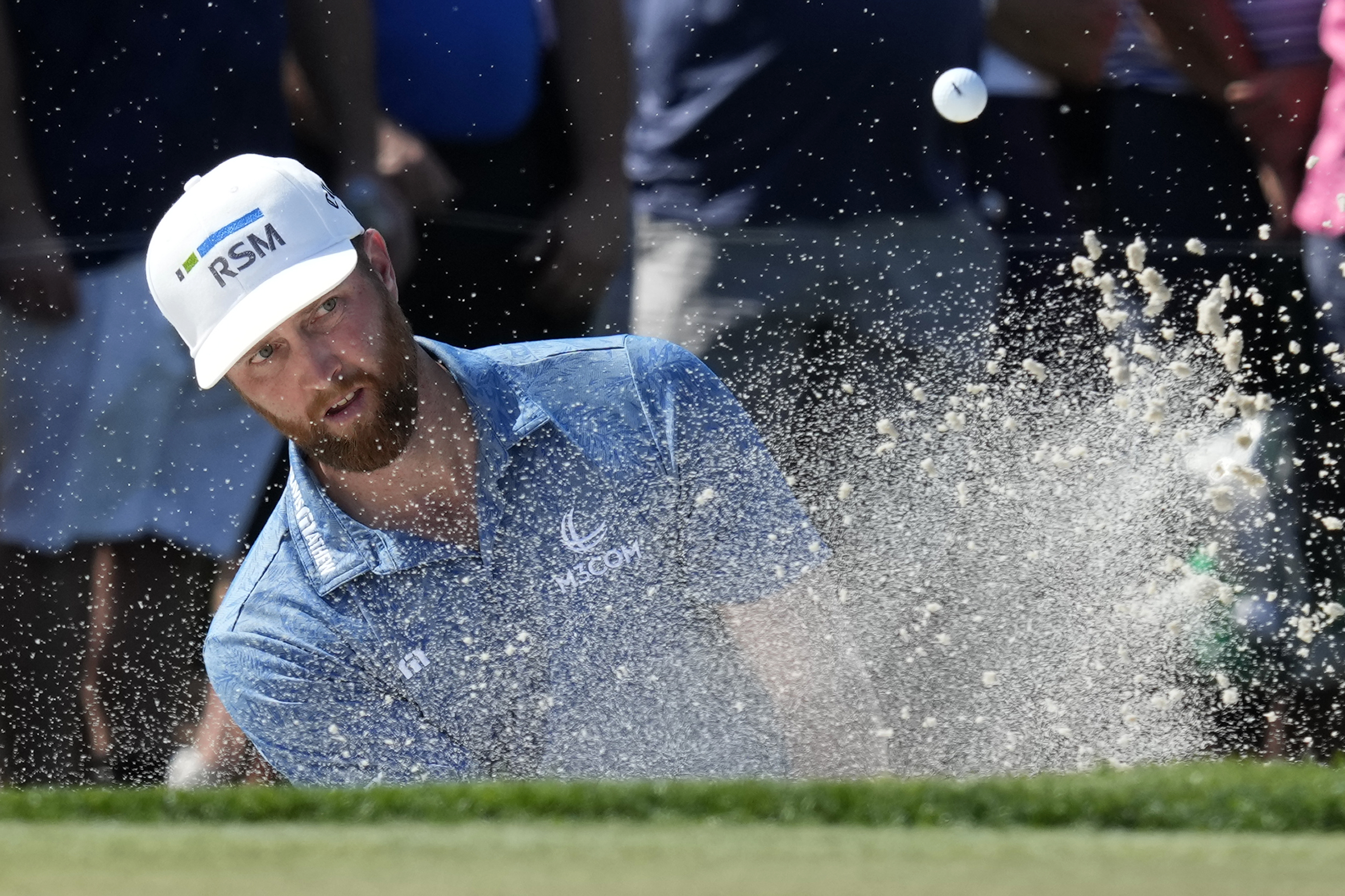 Chris Kirk hits from a bunker onto the third green during the final round of the Honda Classic golf tournament, Sunday, Feb. 26, 2023, in Palm Beach Gardens, Fla. 