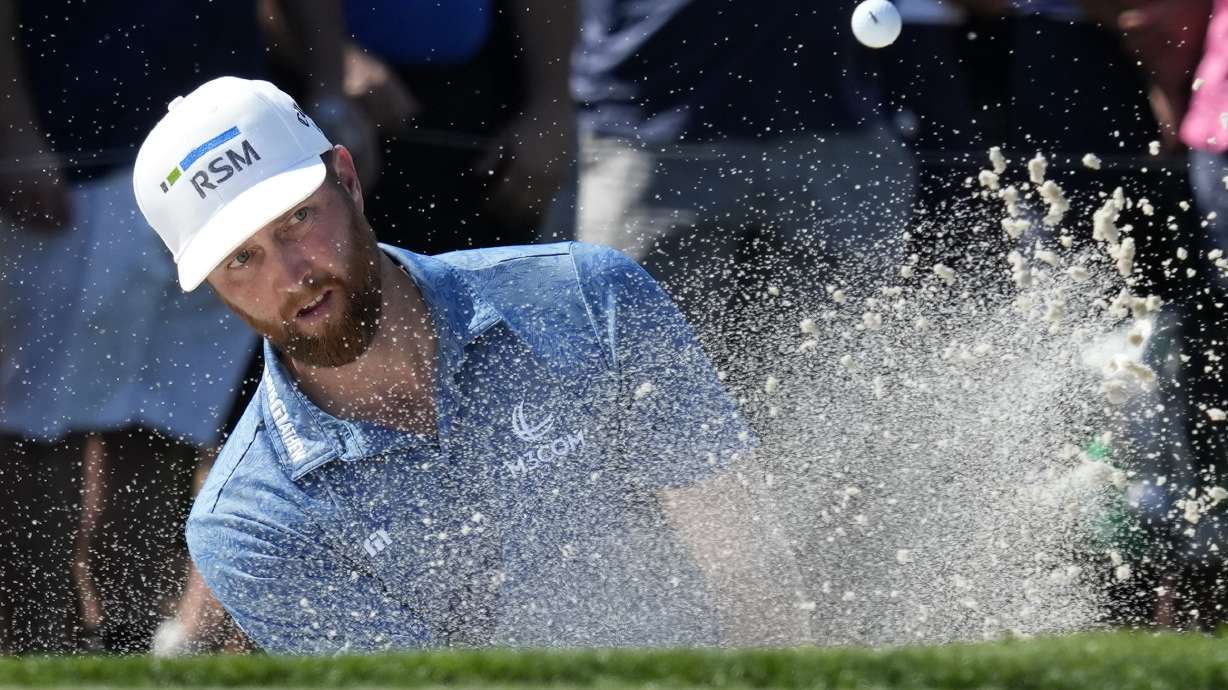 Chris Kirk hits from a bunker onto the third green during the final round of the Honda Classic golf tournament, Sunday, Feb. 26, 2023, in Palm Beach Gardens, Fla.