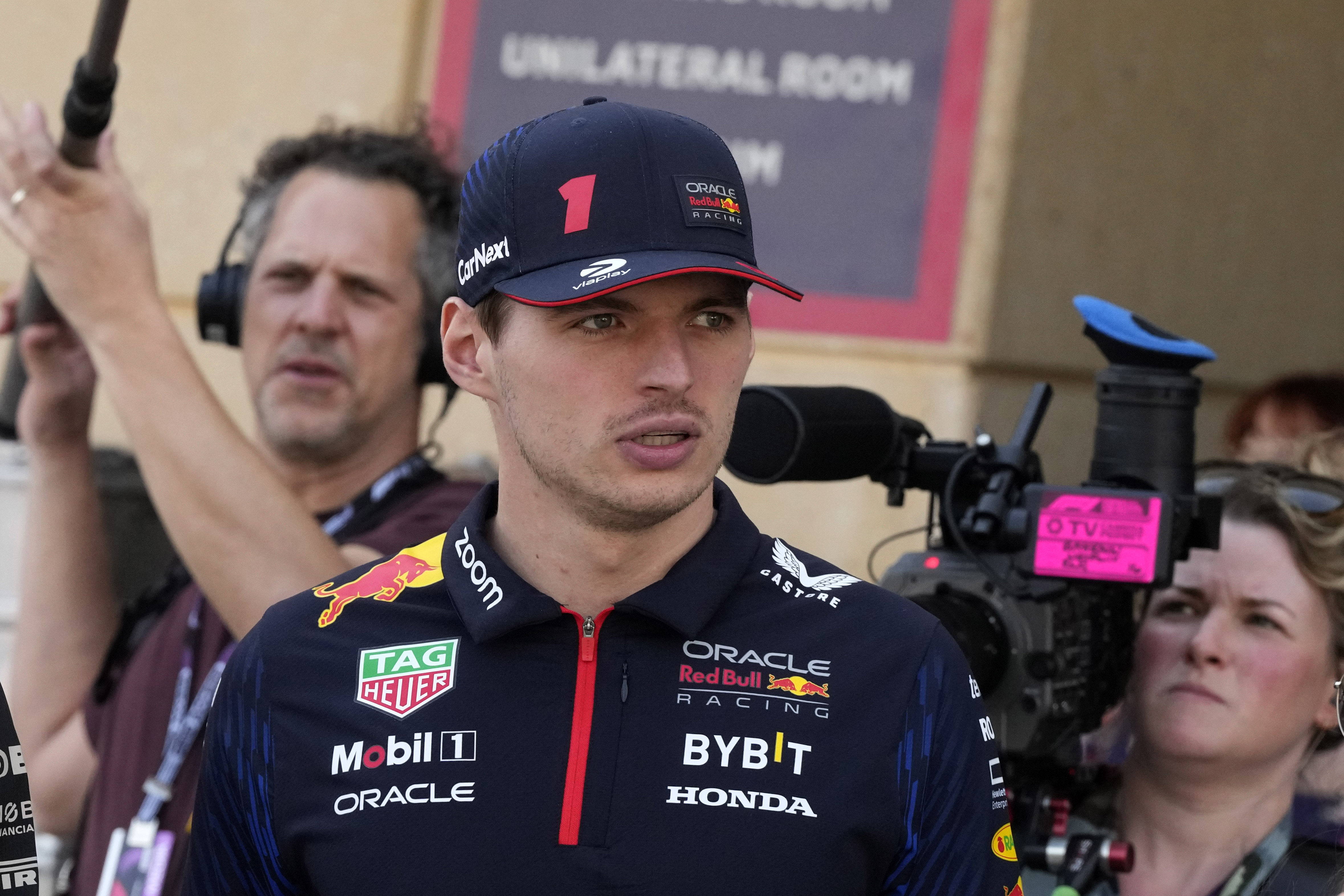 Red Bull driver Max Verstappen of the Netherlands arrives at the paddock during a Formula One pre season test at the Bahrain International Circuit in Sakhir, Bahrain, Saturday, Feb. 25, 2023.