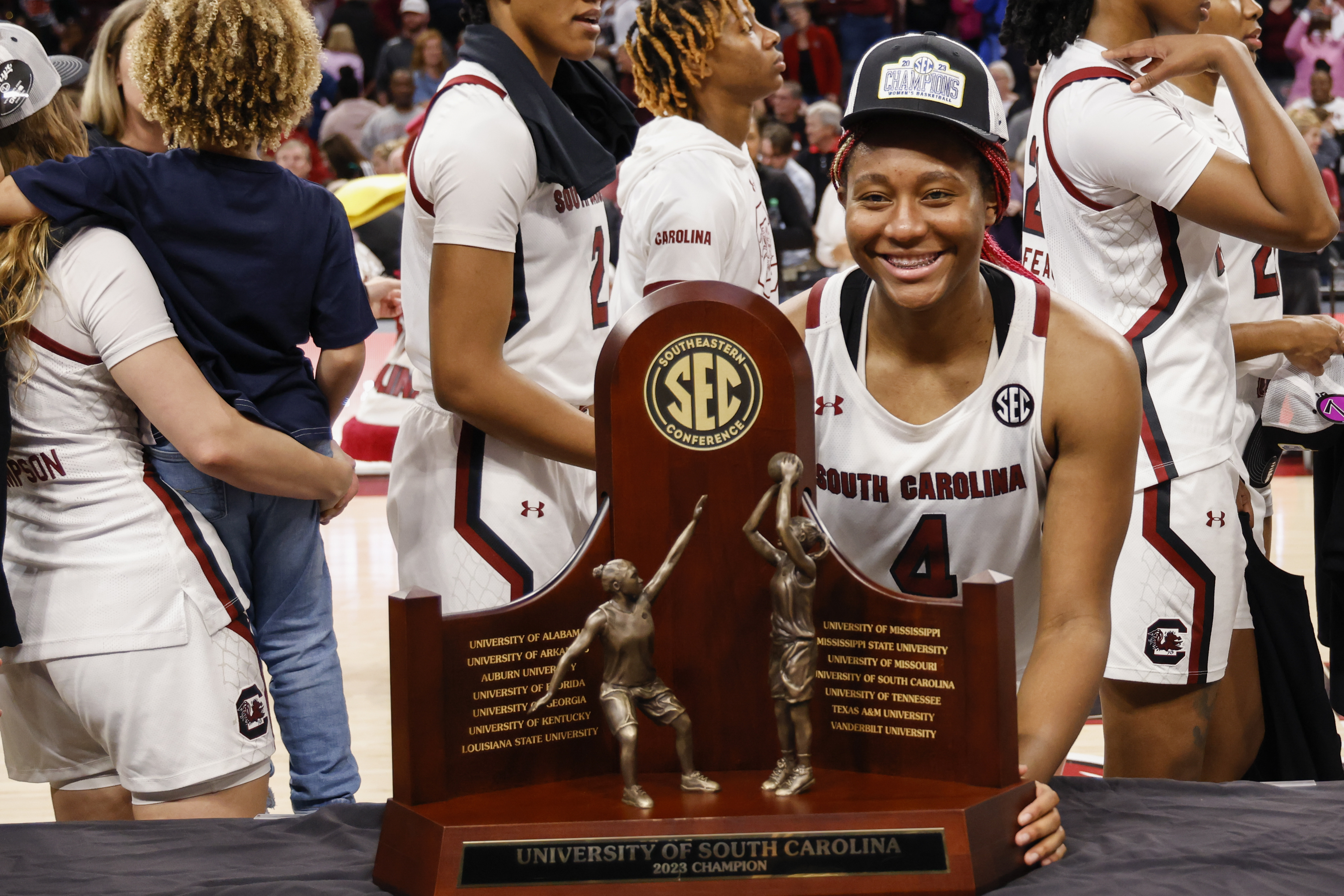 South Carolina forward Aliyah Boston stands with the SEC regular season trophy after South Carolina defeated Georgia 73-63 in an NCAA college basketball game in Columbia, S.C., Sunday, Feb. 26, 2023. 