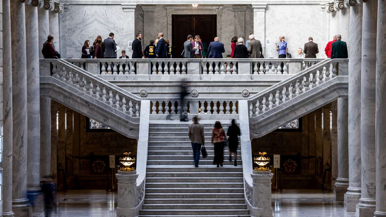 People gather near the House Chamber at the Capitol in Salt Lake City on Feb. 24. The Utah House on Monday approved a proposed constitutional amendment that would raise the bar for passing citizen initiatives that include tax increases.