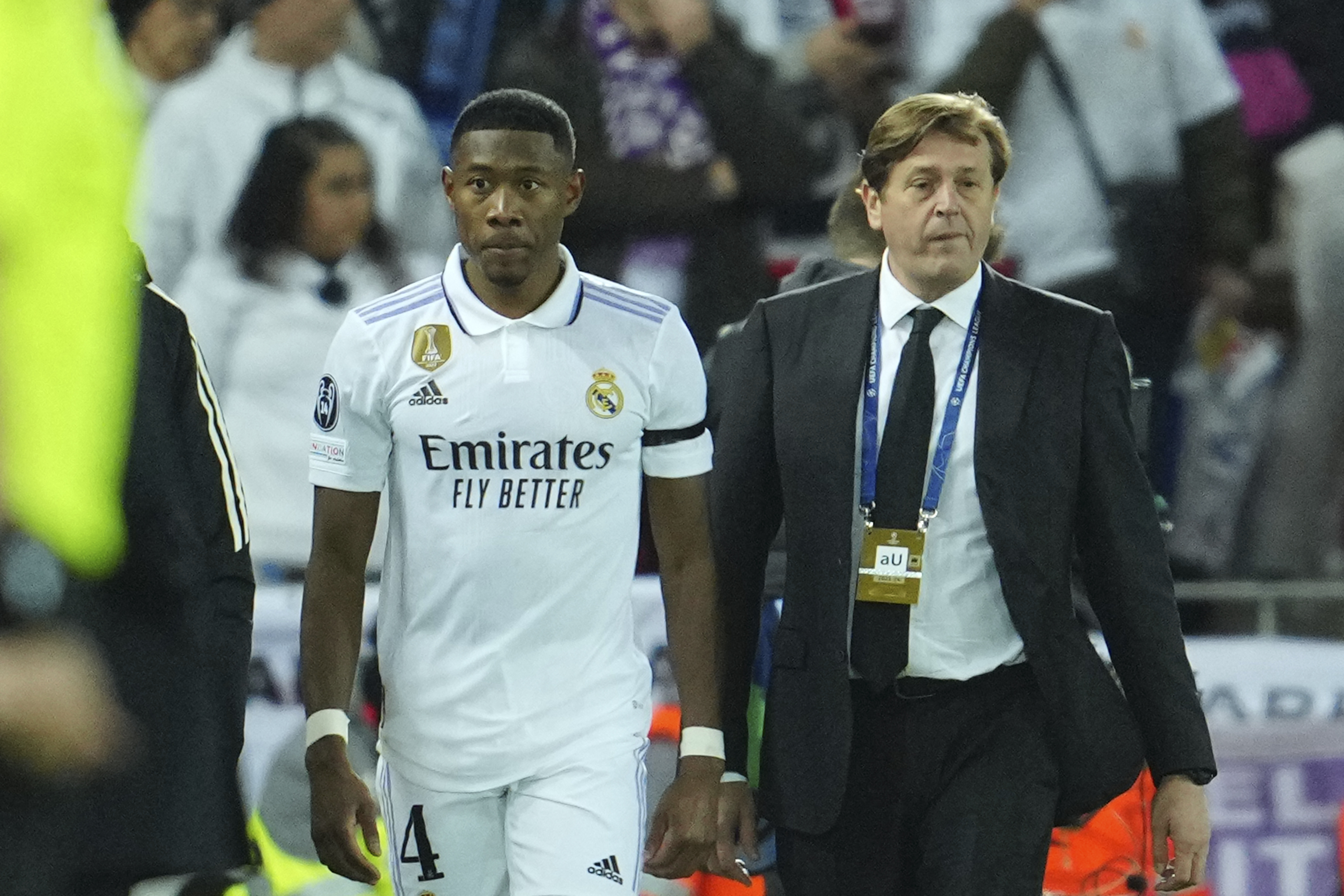 Real Madrid's David Alaba walks off the pitch while he is substituted by Real Madrid's Nacho after being injured during the Champions League, round of 16, first leg soccer match between Liverpool and Real Madrid at the Anfield stadium in Liverpool, England, Tuesday, Feb. 21, 2023. 