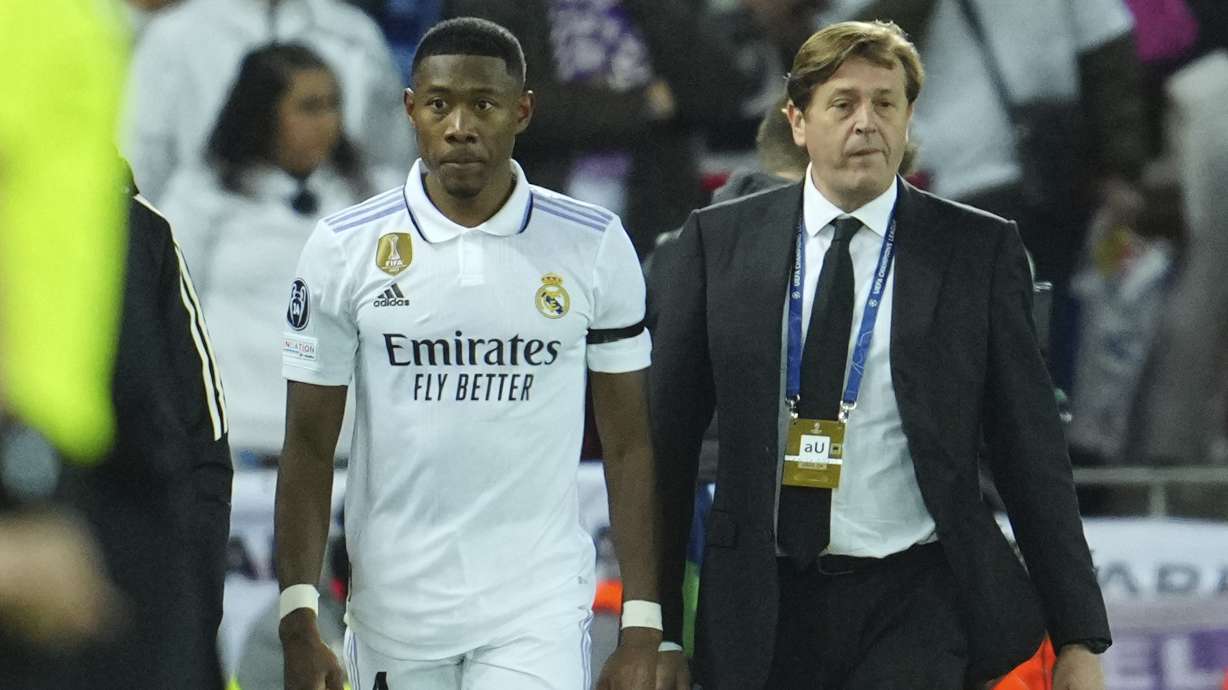 Real Madrid's David Alaba walks off the pitch while he is substituted by Real Madrid's Nacho after being injured during the Champions League, round of 16, first leg soccer match between Liverpool and Real Madrid at the Anfield stadium in Liverpool, England, Tuesday, Feb. 21, 2023.