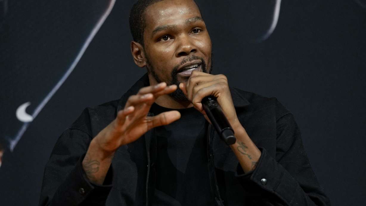 Phoenix Suns forward Kevin Durant, speaks to the media after being introduced during an NBA basketball team availability, Thursday, Feb. 16, 2023, in Phoenix.