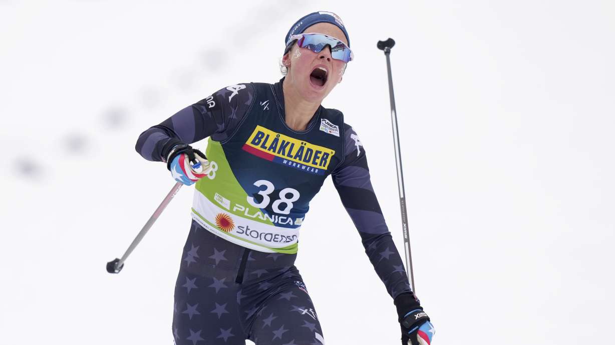 Jessie Diggins, of the United States, crosses the finish line in the Women's Cross Country Interval Start 10 KM Free event at the Nordic World Championships in Planica, Slovenia, Tuesday, Feb. 28, 2023.