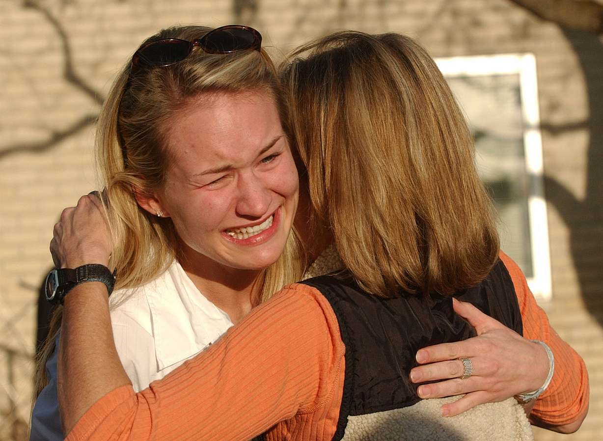 Sierra Smart hugs her mom, Heidi, at the Federal Heights Ward meetinghouse in Salt Lake City on March 12, 2003, after Elizabeth Smart was found.