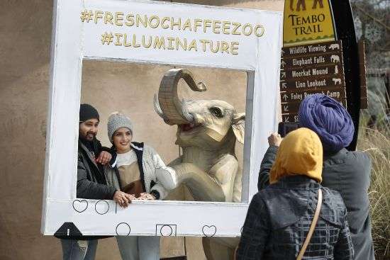 Pawan and Love Deep are photographed at the entrance to the elephant exhibit at the Fresno Chaffee Zoo in Fresno, Calif., Jan. 19. A community in the heart of California's farm belt has been drawn into a growing global debate over whether elephants should be in zoos.