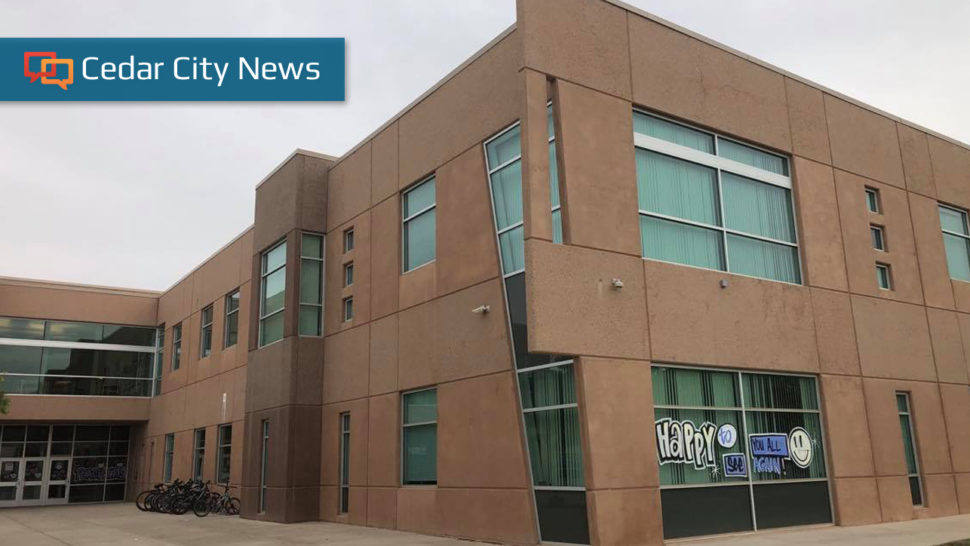 A teenager was taken into custody after assaulting one Canyon View High School student and pointing a gun at four others Monday afternoon.
