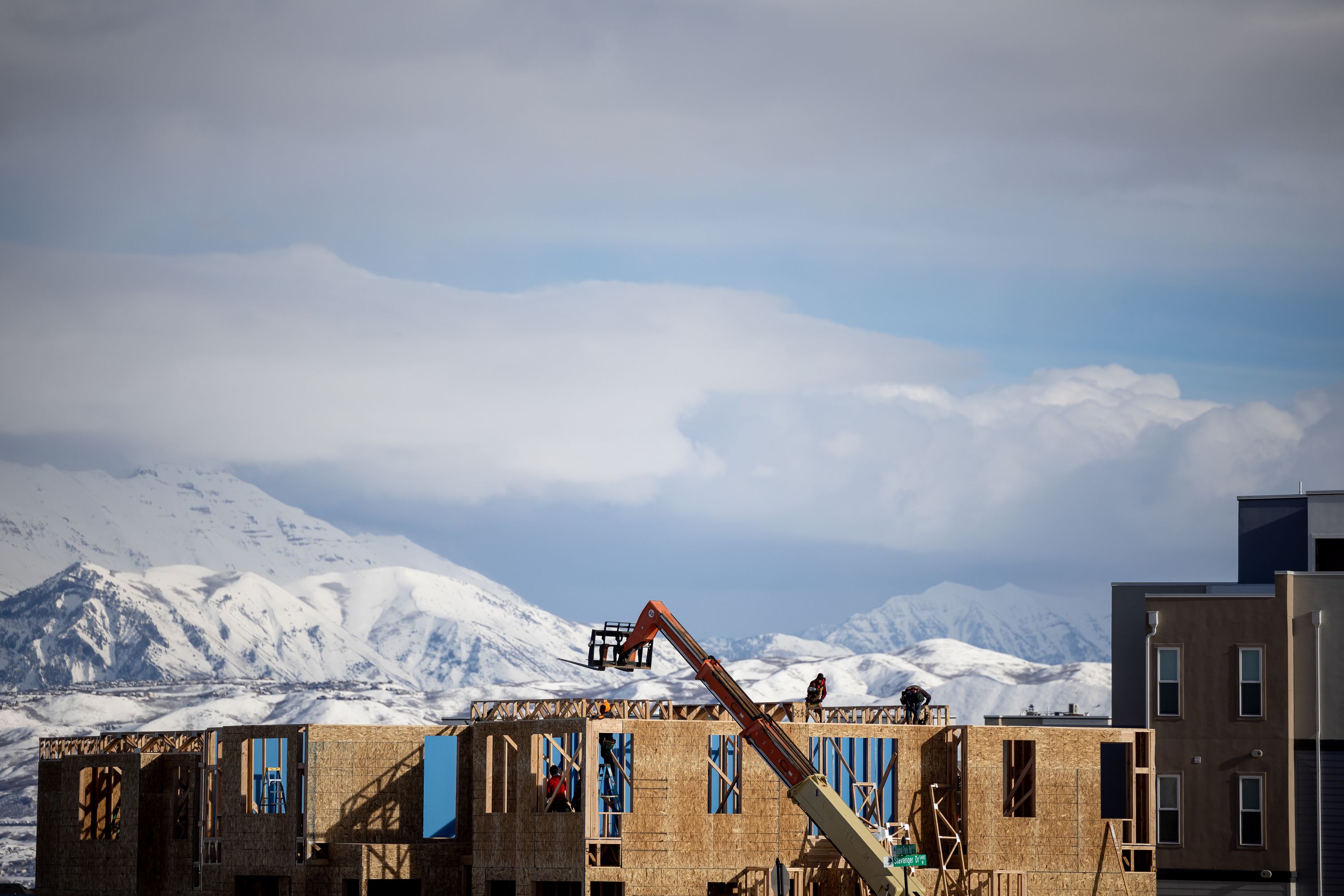 Work continues on a multi-family housing development in South Jordan on Feb. 28.