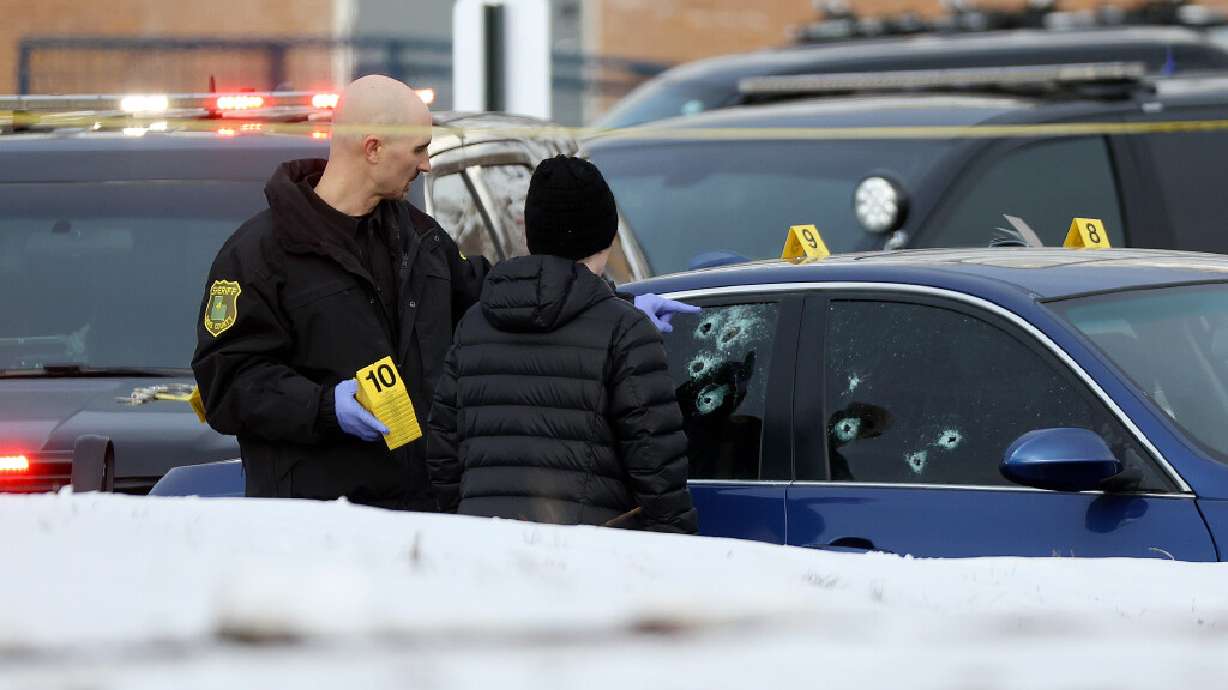Emergency responders work at the scene of a police shooting in Farmington on Wednesday. The man shot by officers following what began as a "routine traffic stop" has died.